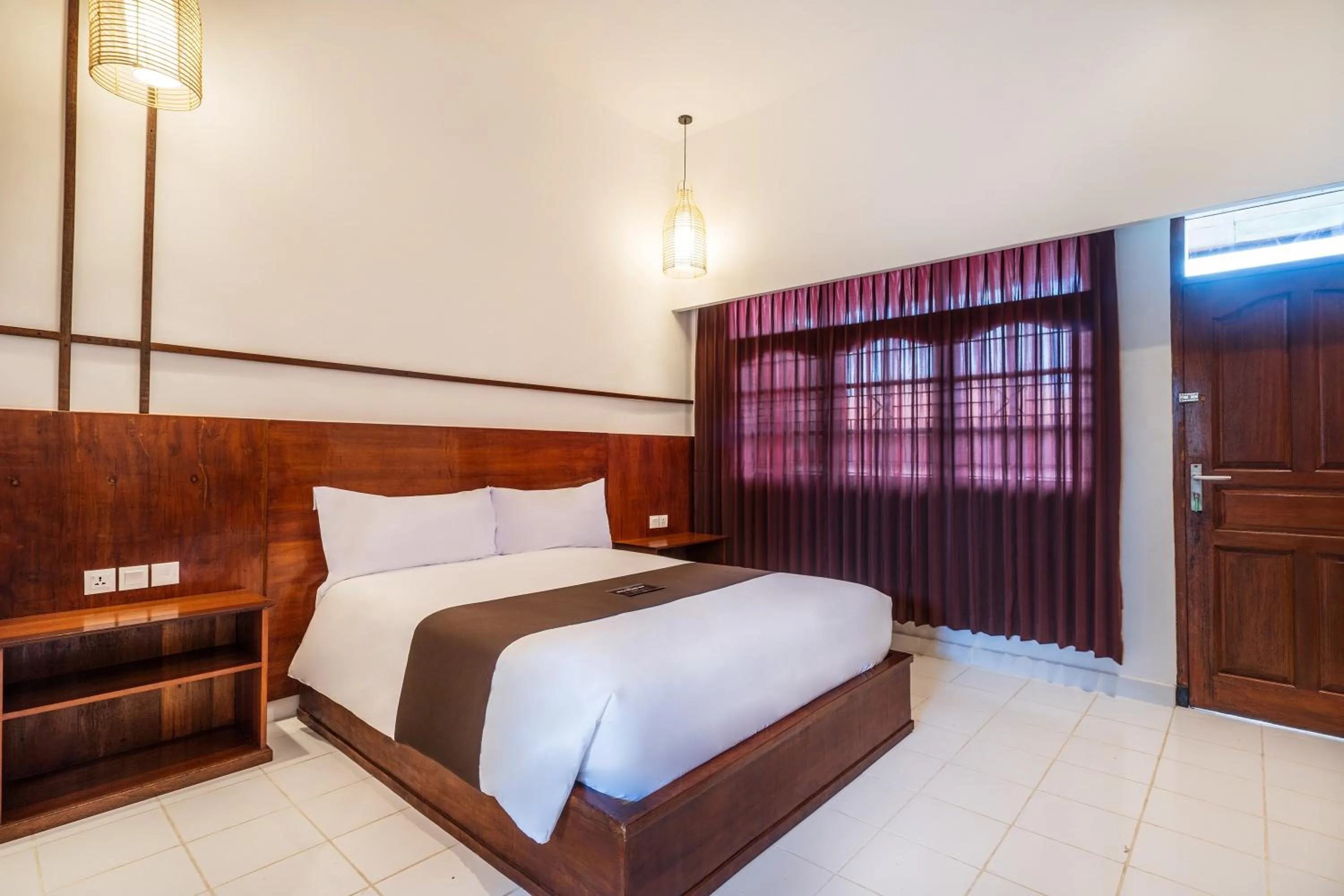 Bed in Suka Beach Inn