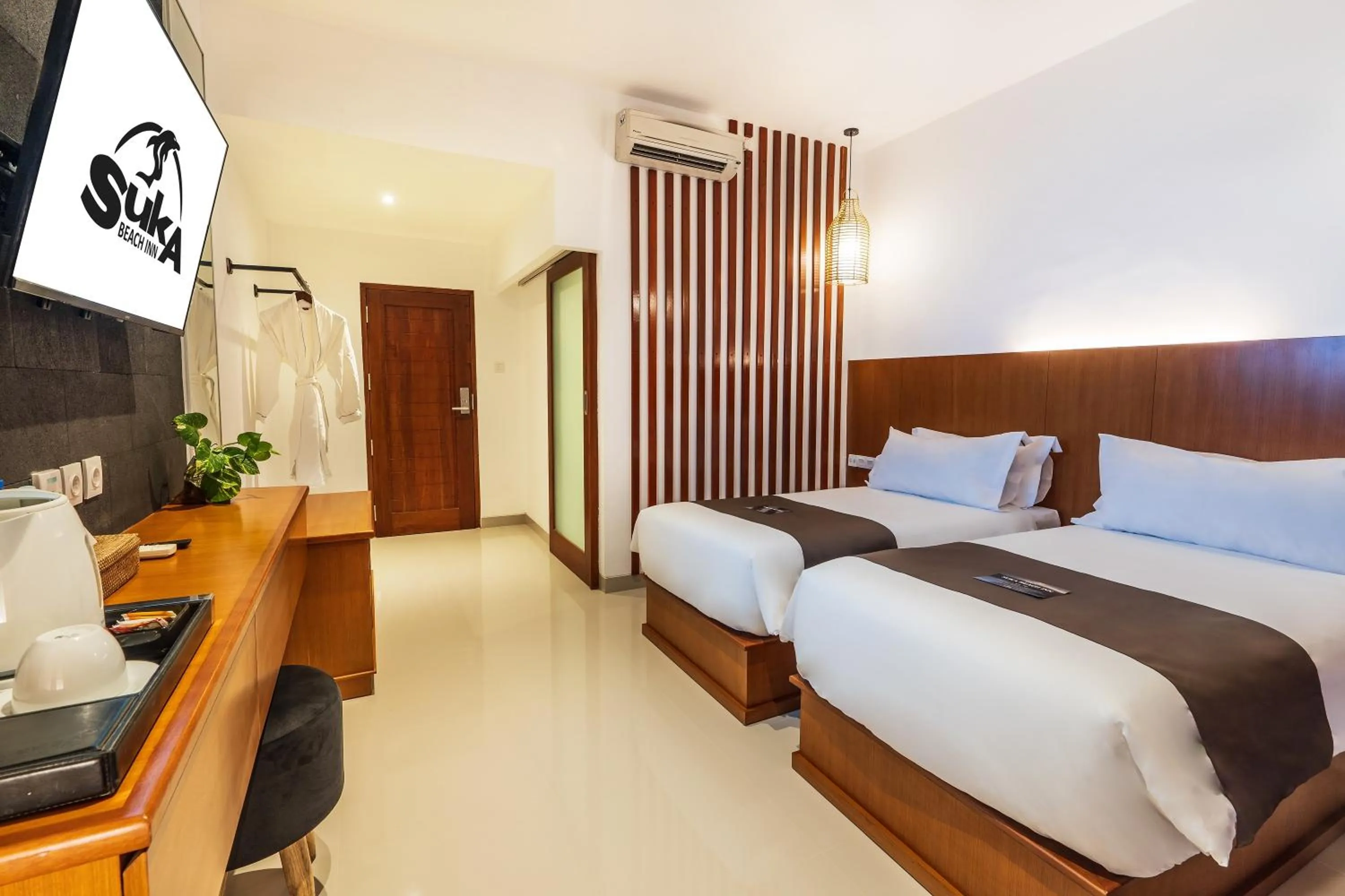 Bed in Suka Beach Inn