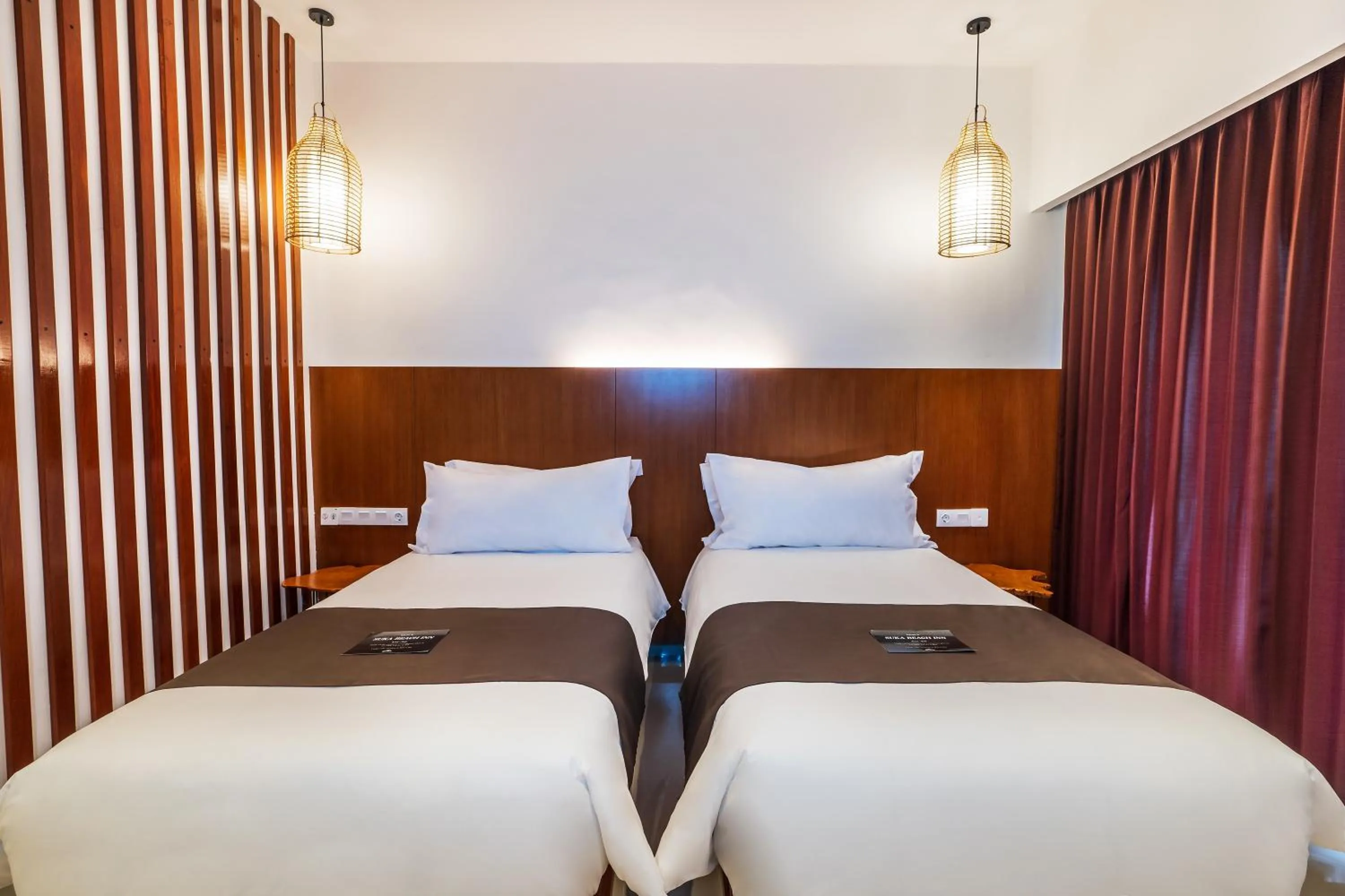 Bed in Suka Beach Inn