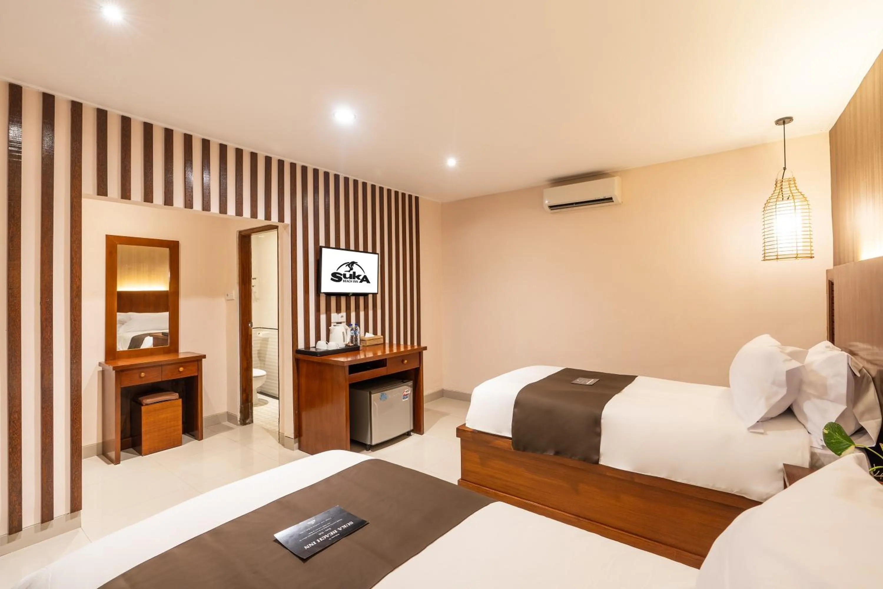 Bed in Suka Beach Inn