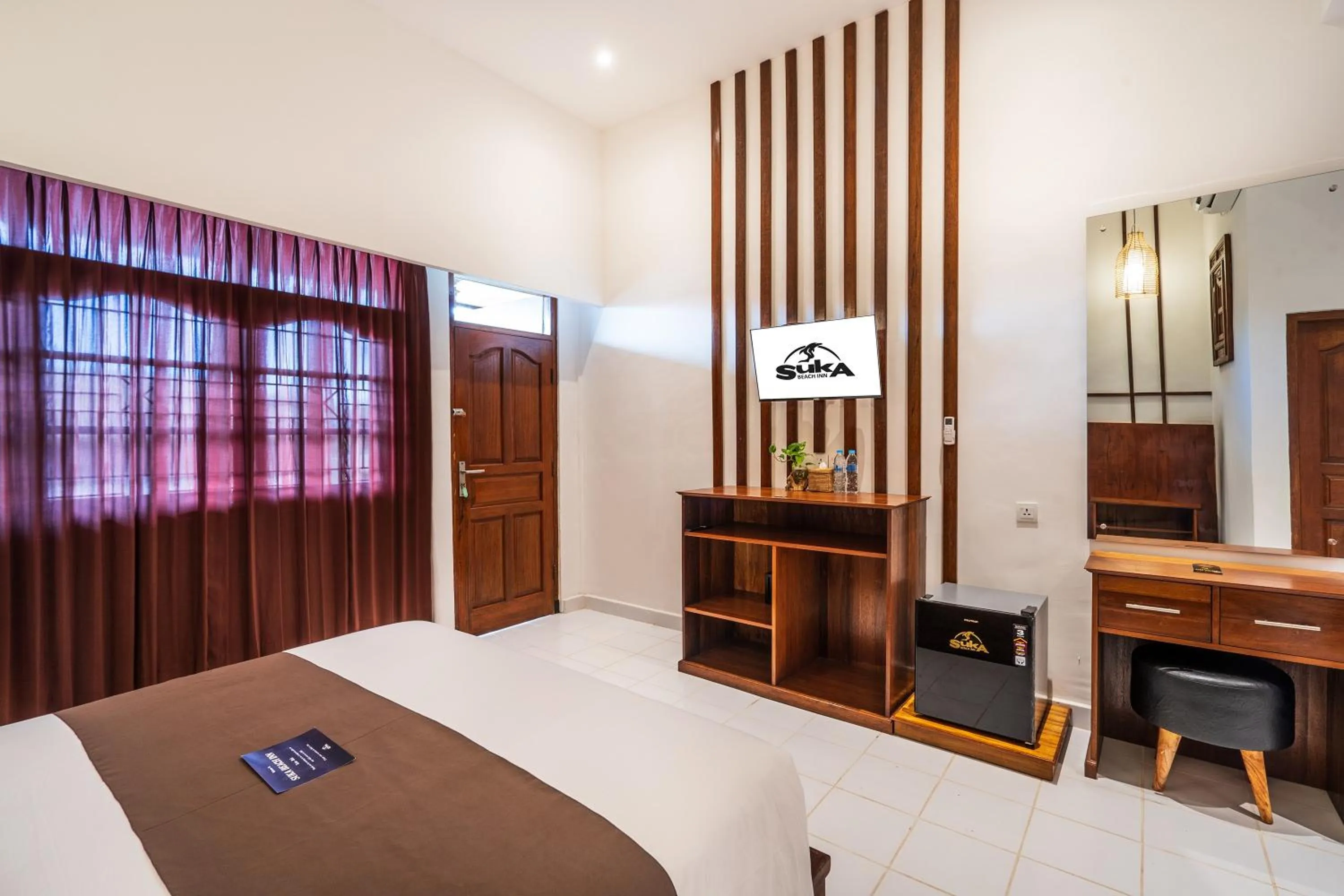 Bedroom, Bed in Suka Beach Inn