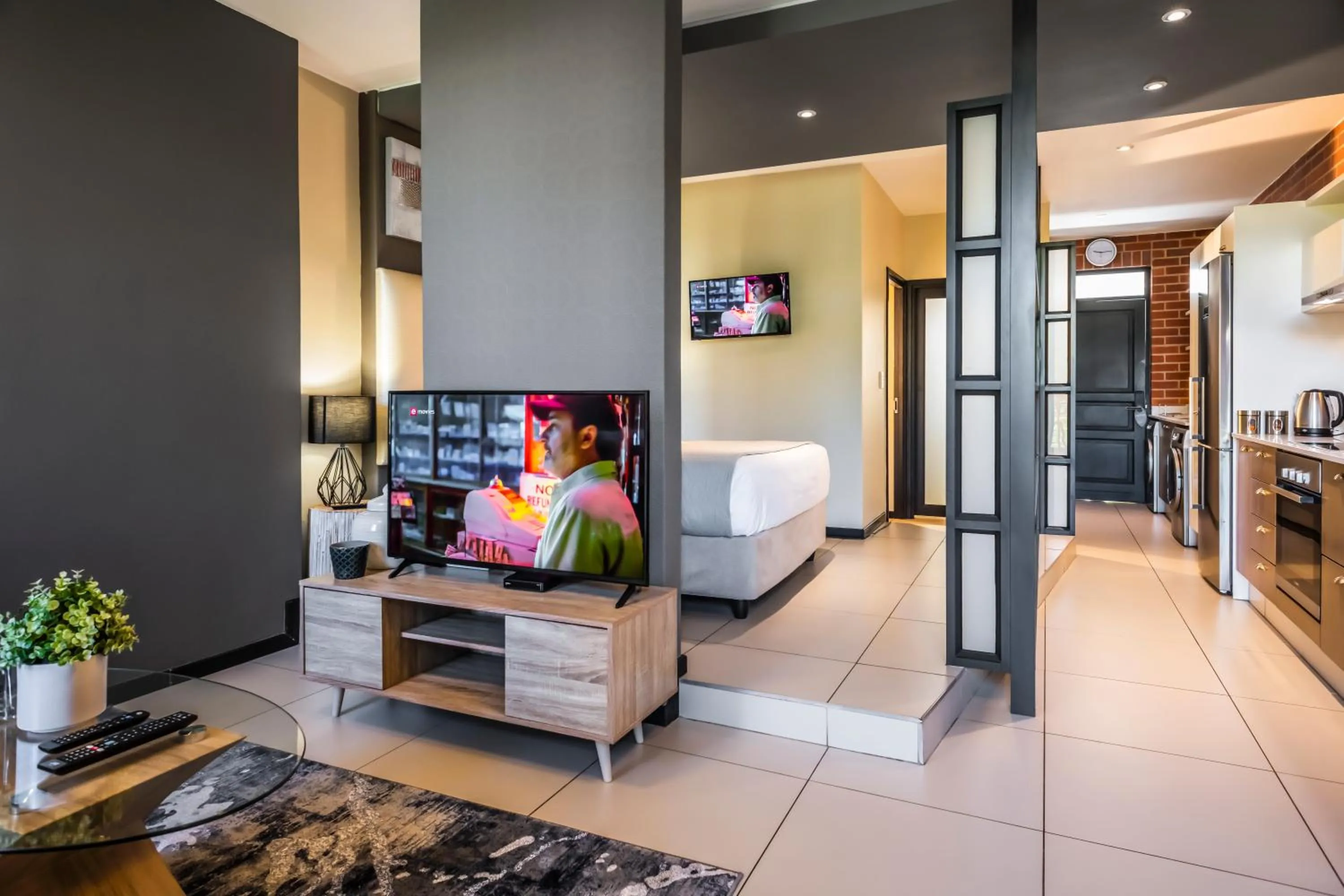 Living room, Bed in CAG The Vantage Rosebank