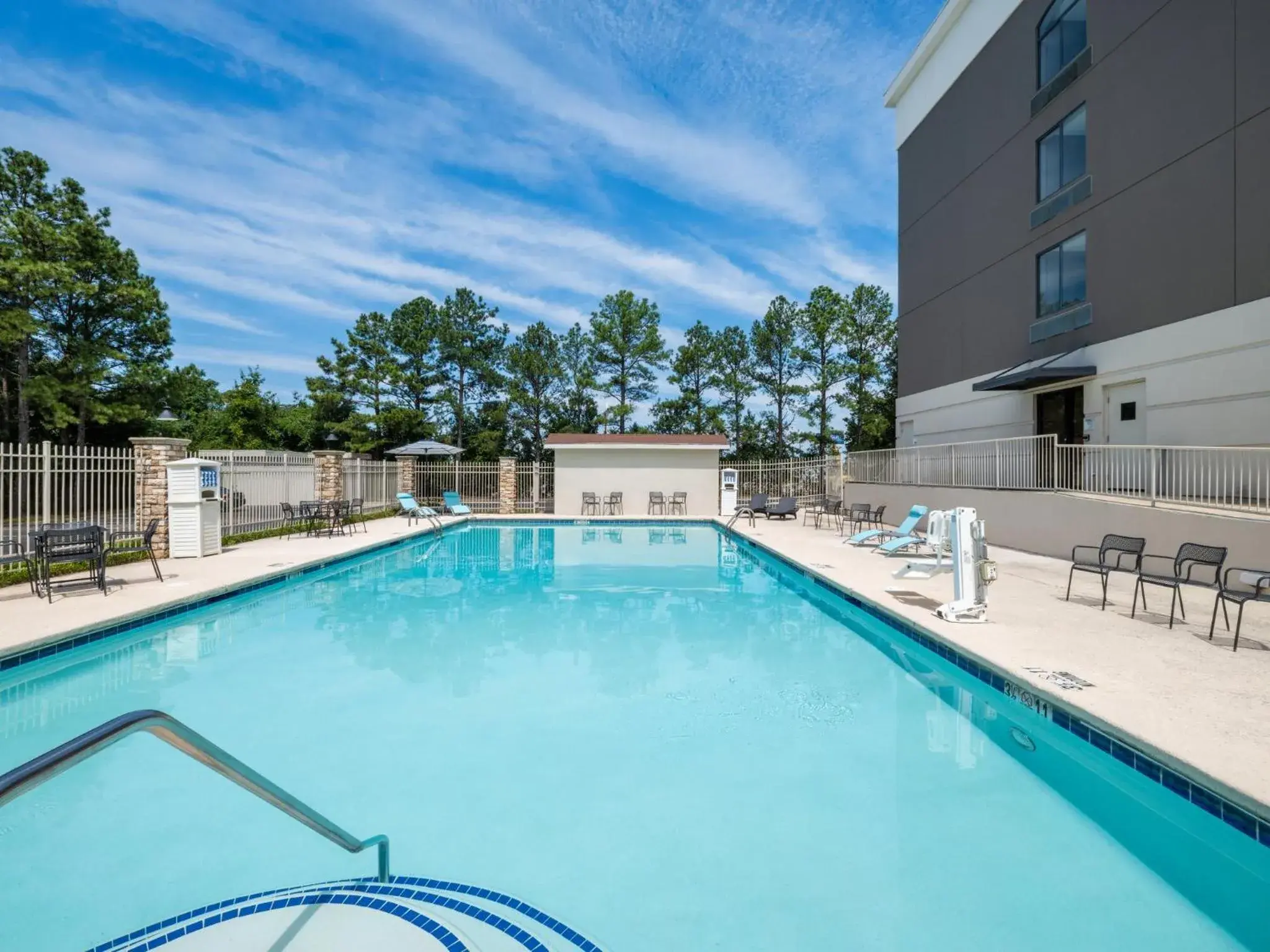 Swimming pool in Holiday Inn Express & Suites Augusta West - Ft Gordon Area by IHG Swimming pool in Holiday Inn Express & Suites Augusta West - Ft Gordon Area by IHG