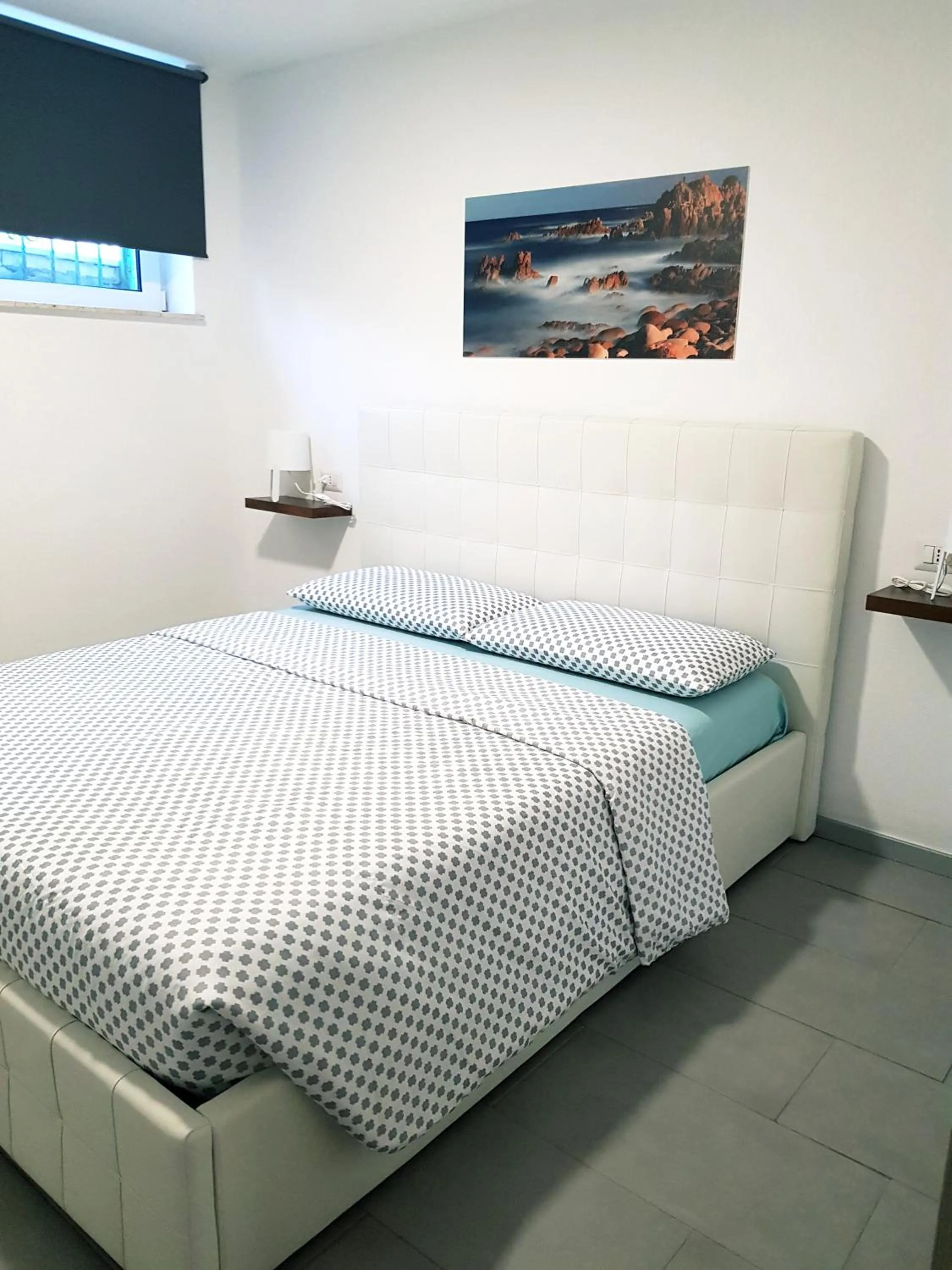 Decorative detail, Bed in Casa del Sole Irgoli - BIKERS HOME