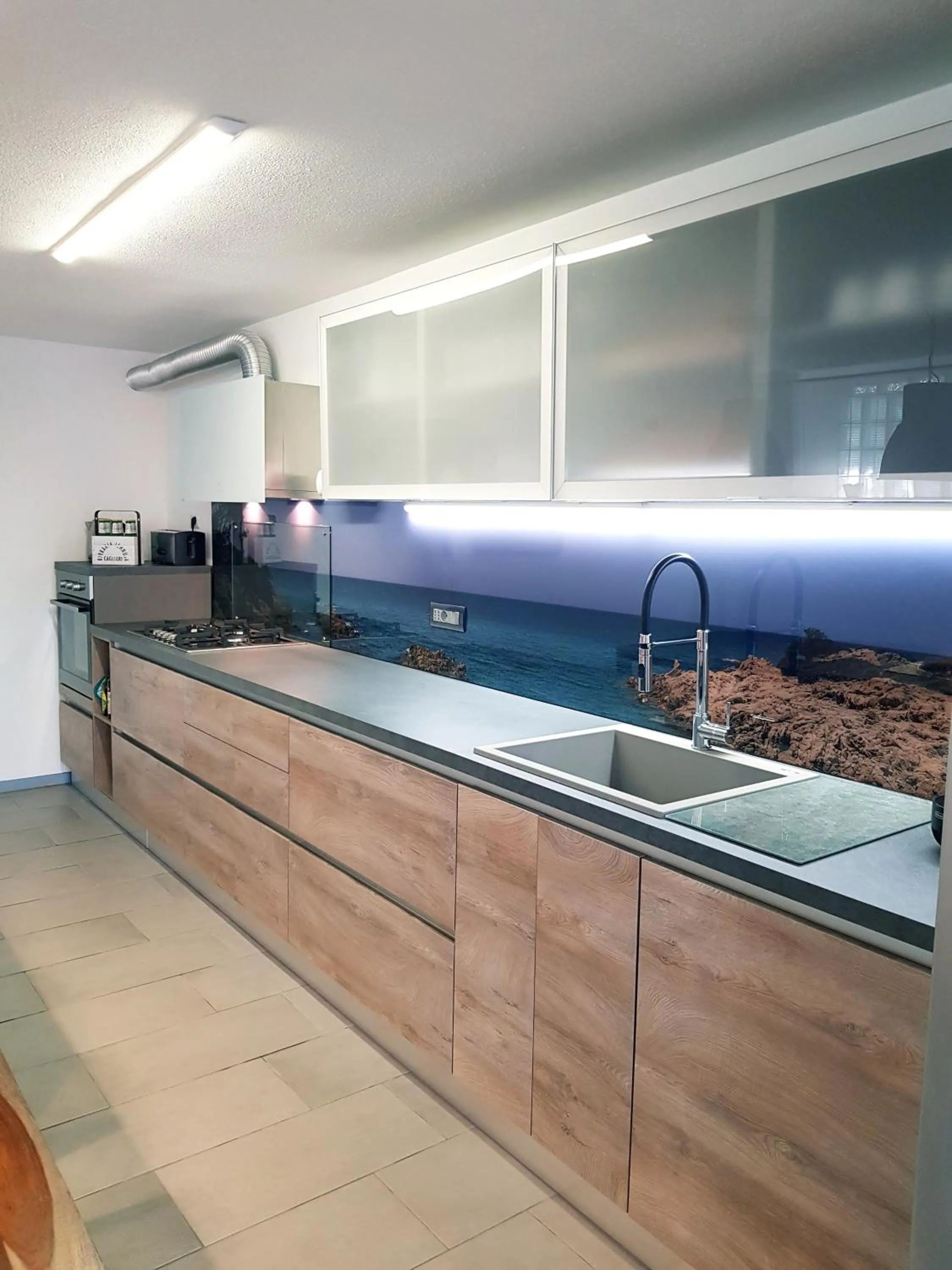 Kitchen or kitchenette in Casa del Sole Irgoli - BIKERS HOME