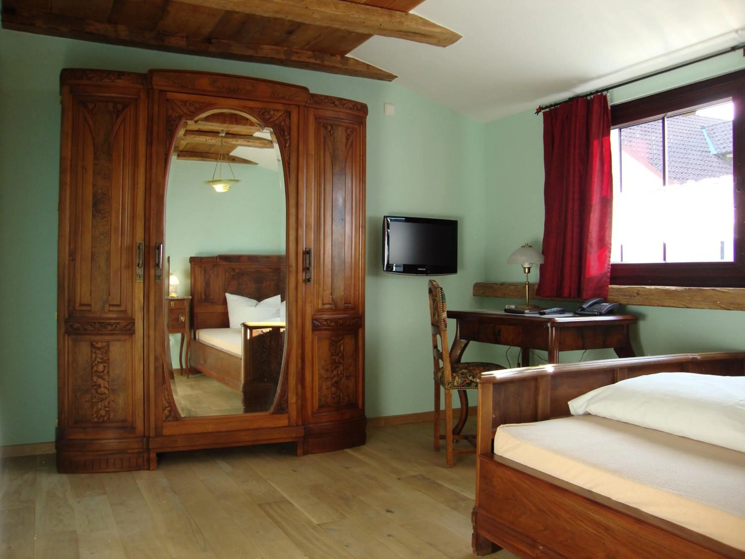 Photo of the whole room, Bed in Historisches Genusshotel Löwen