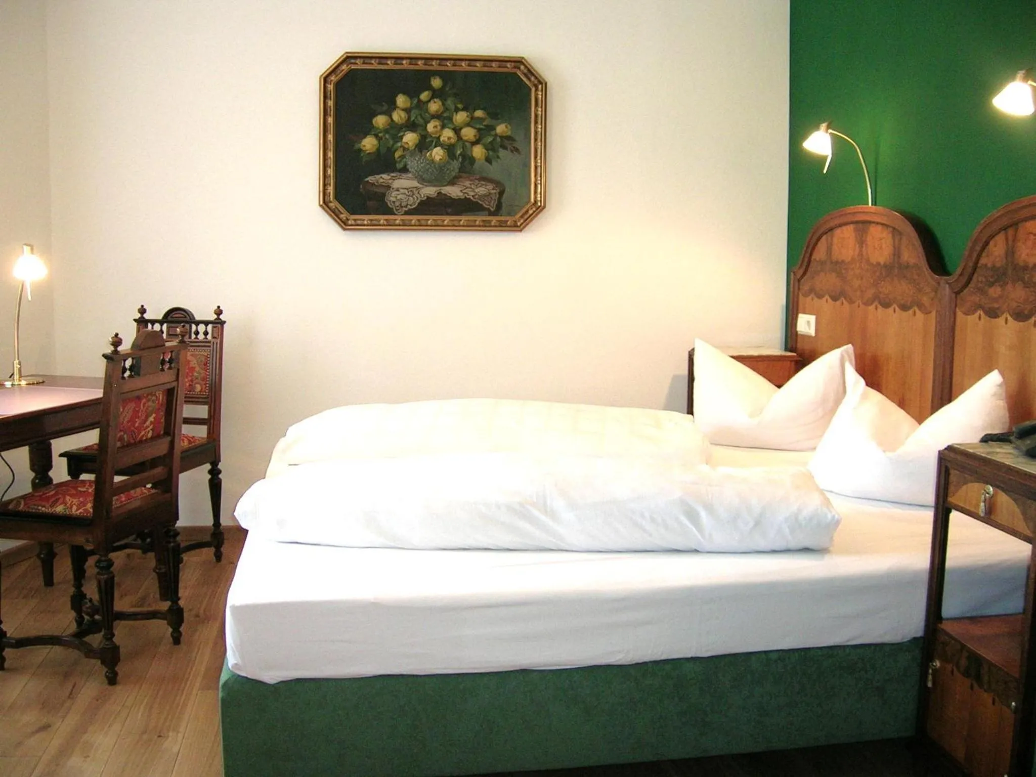 Photo of the whole room, Bed in Historisches Genusshotel Löwen