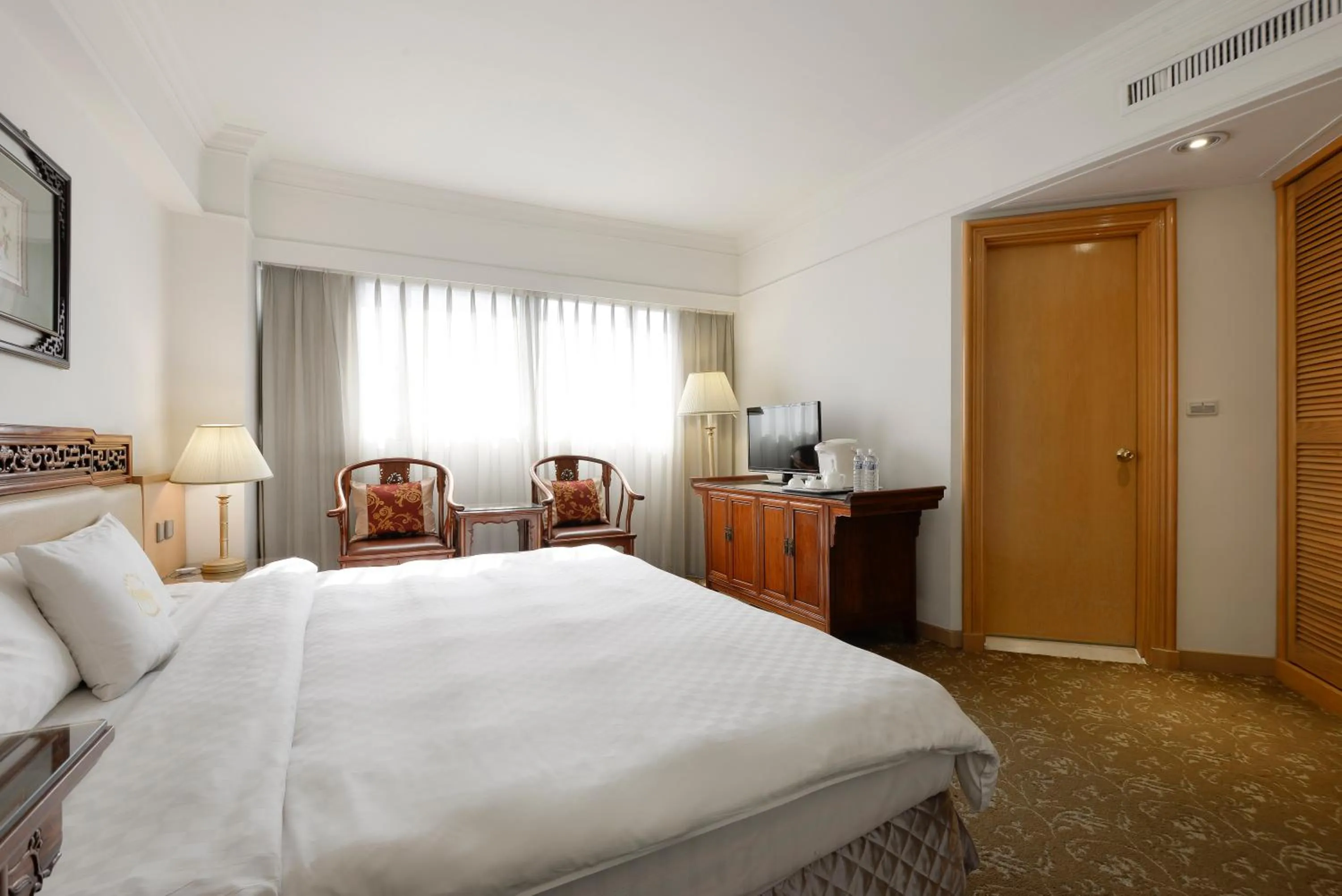 Bed in Hotel Sunshine