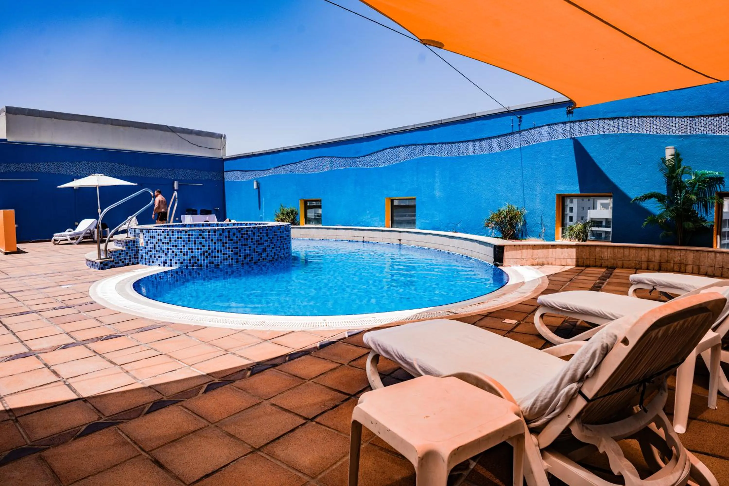 Swimming pool in Grand Bellevue Hotel Apartment Dubai