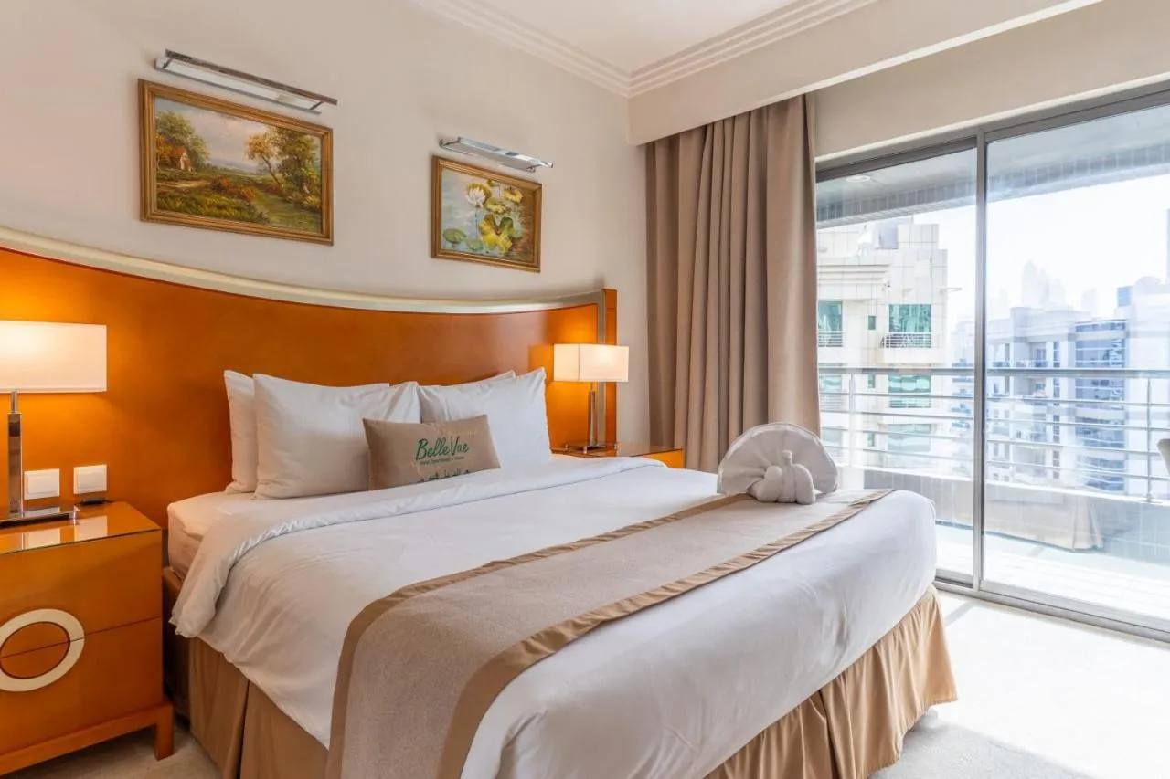 Bed in Grand Bellevue Hotel Apartment Dubai