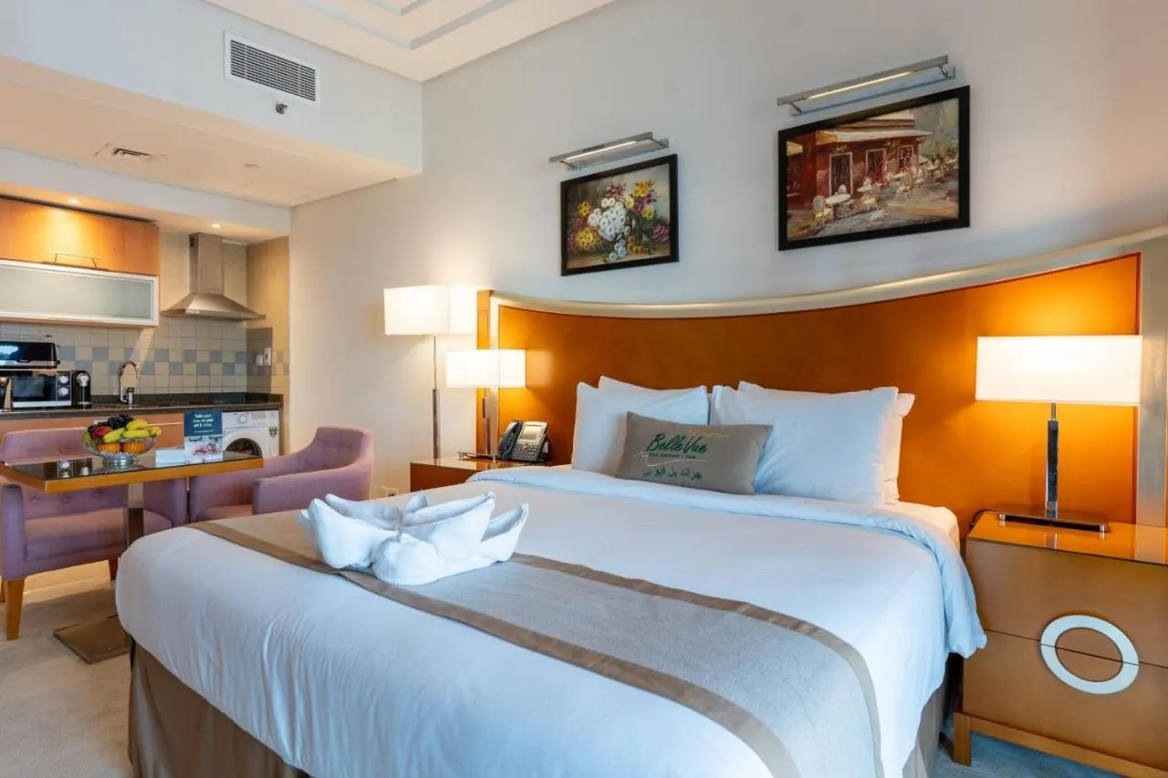 Bed in Grand Bellevue Hotel Apartment Dubai