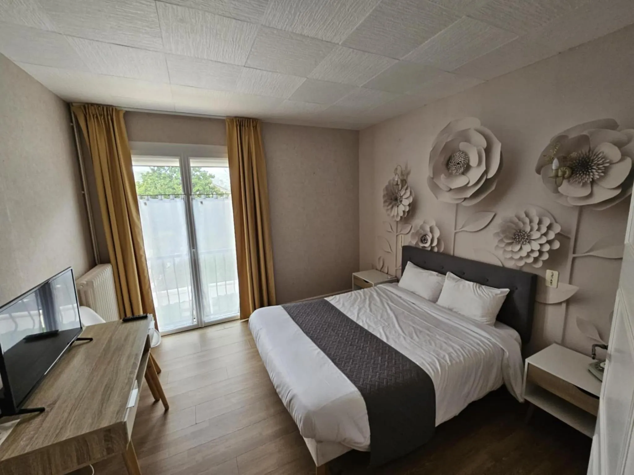 Bed in Hotel du Commerce Chez Stéphane