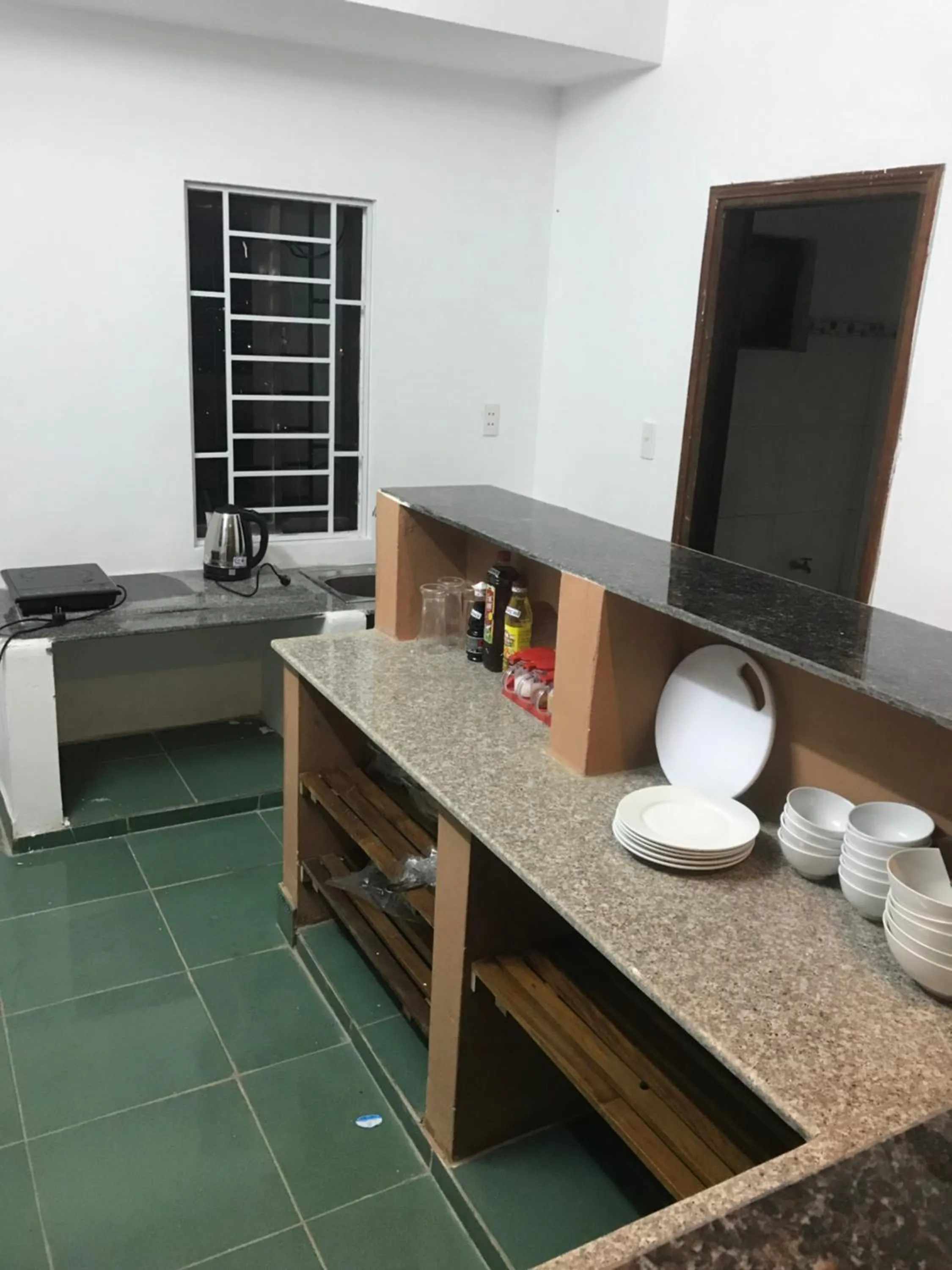 Communal kitchen in Thao Trang Hotel