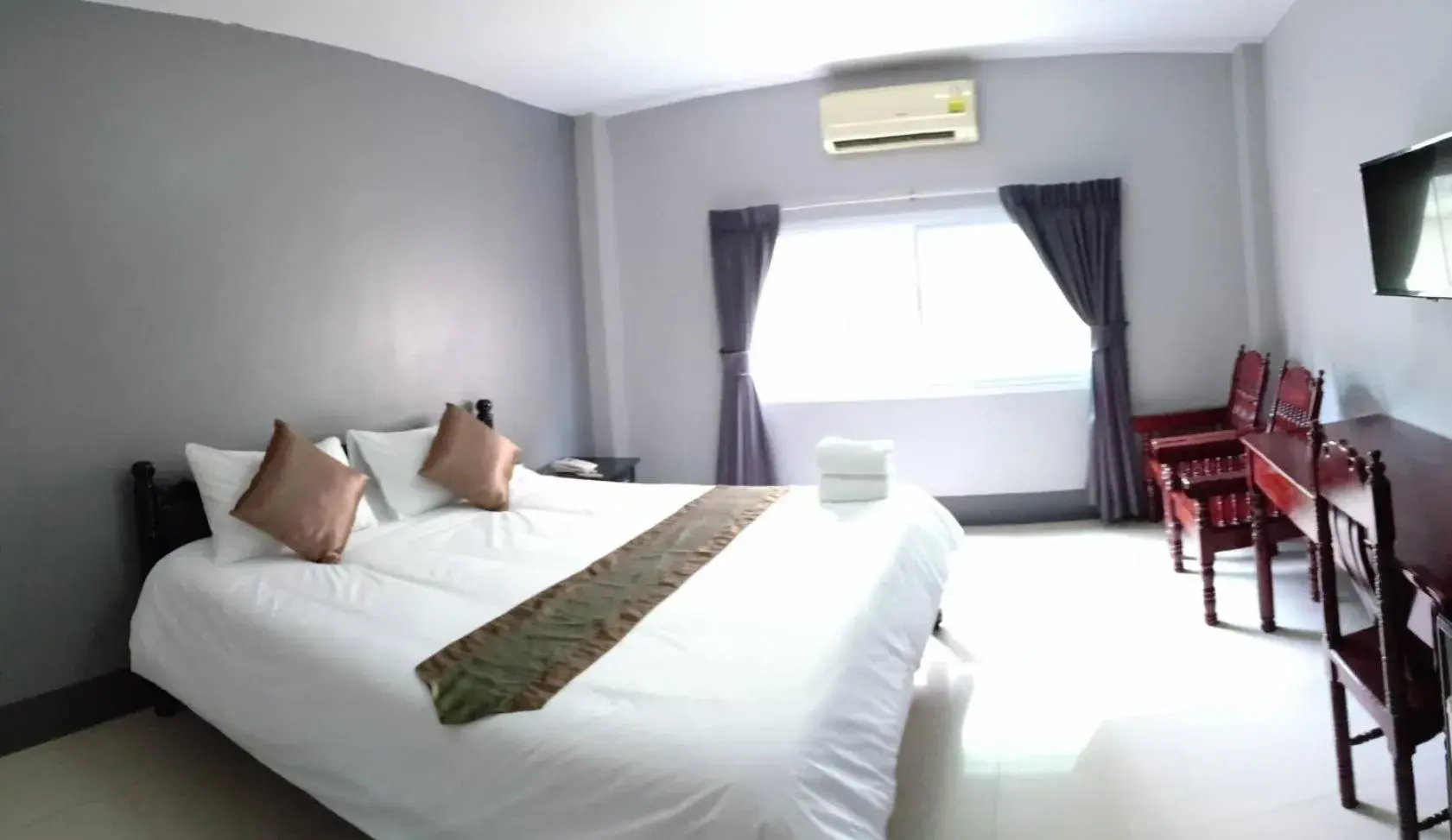 Bed in Submukda Phoomplace Hotel Bed in Submukda Phoomplace Hotel