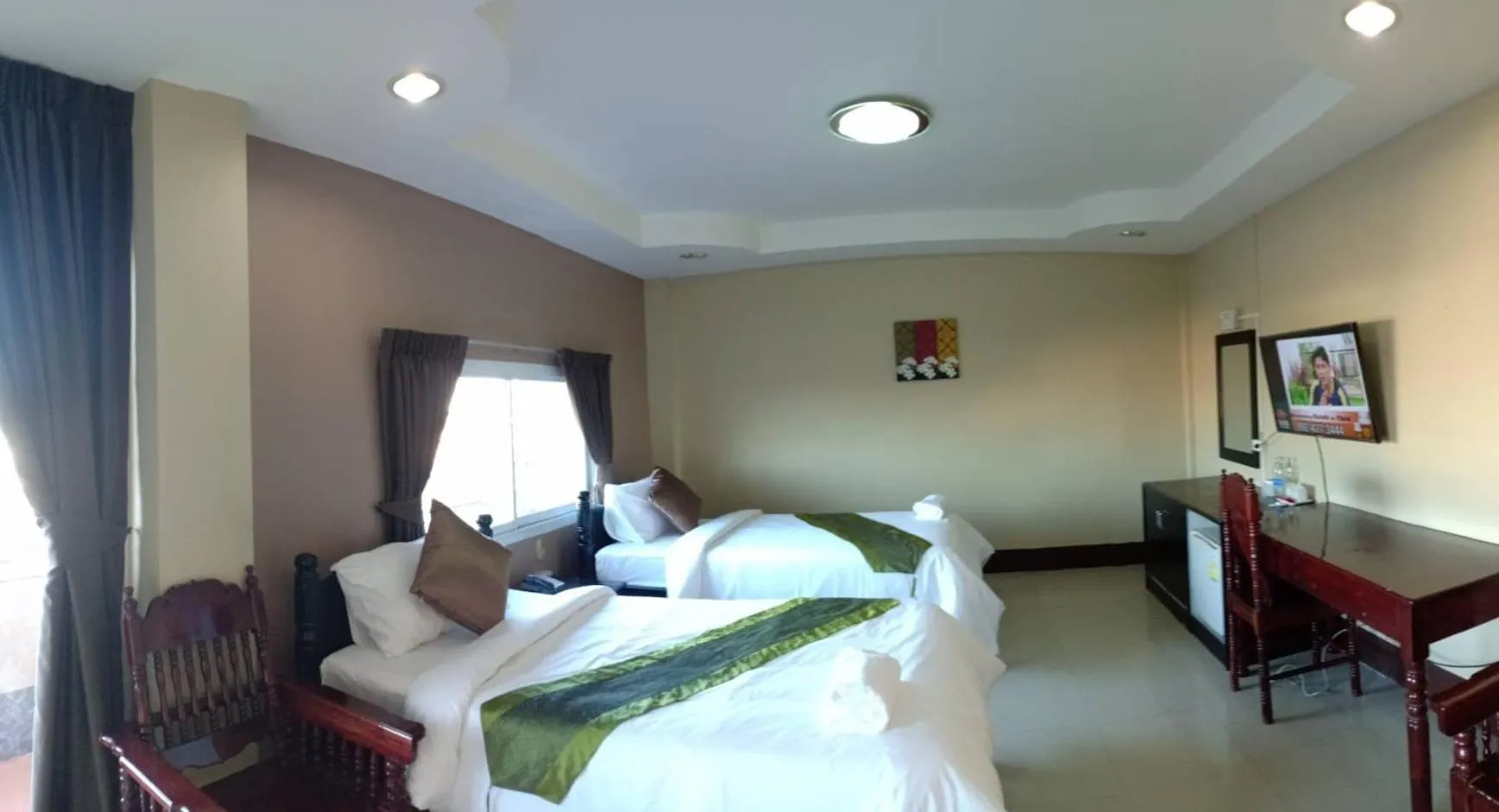 Bed in Submukda Phoomplace Hotel