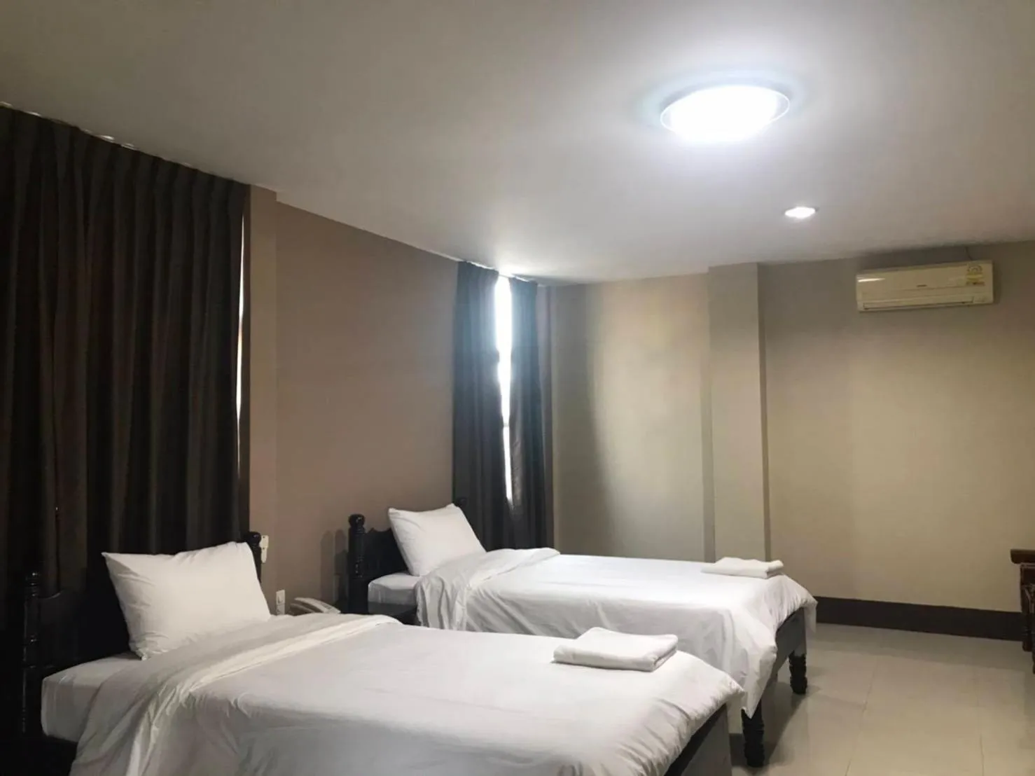 Bed in Submukda Phoomplace Hotel