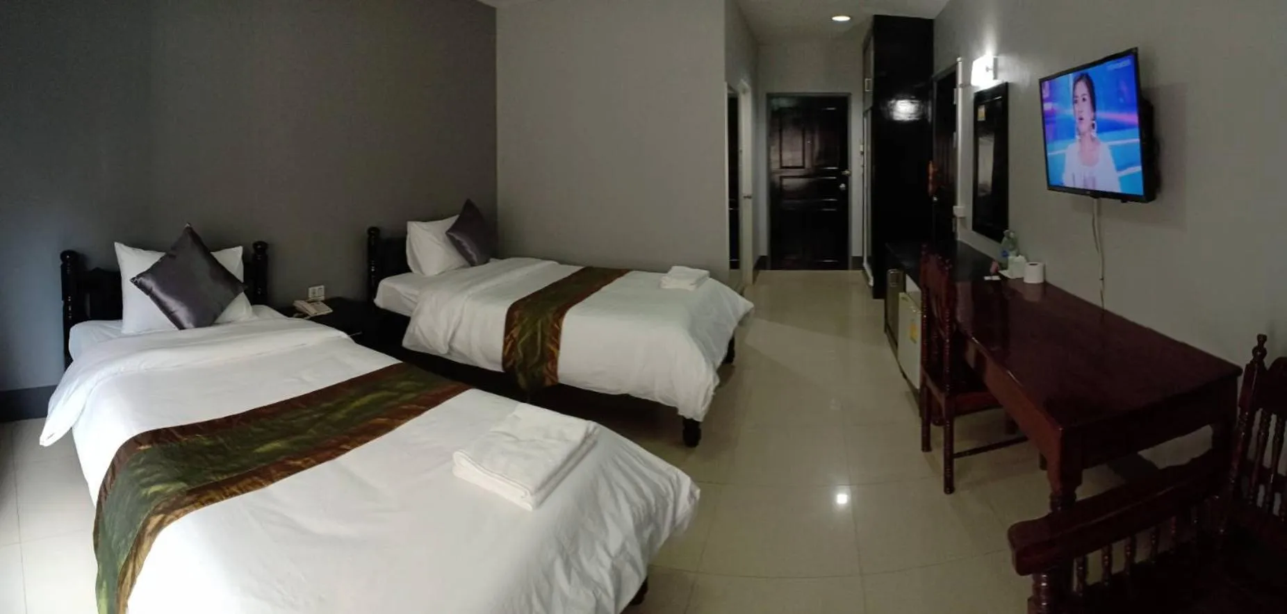 Bed in Submukda Phoomplace Hotel