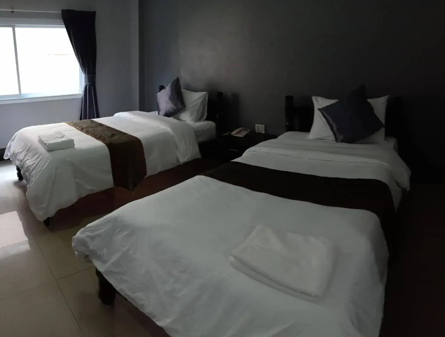 Bed in Submukda Phoomplace Hotel Bed in Submukda Phoomplace Hotel