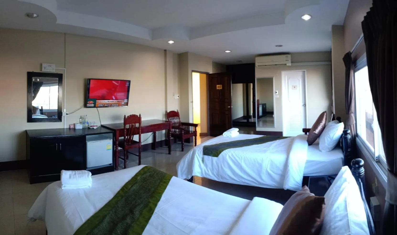 Bed in Submukda Phoomplace Hotel