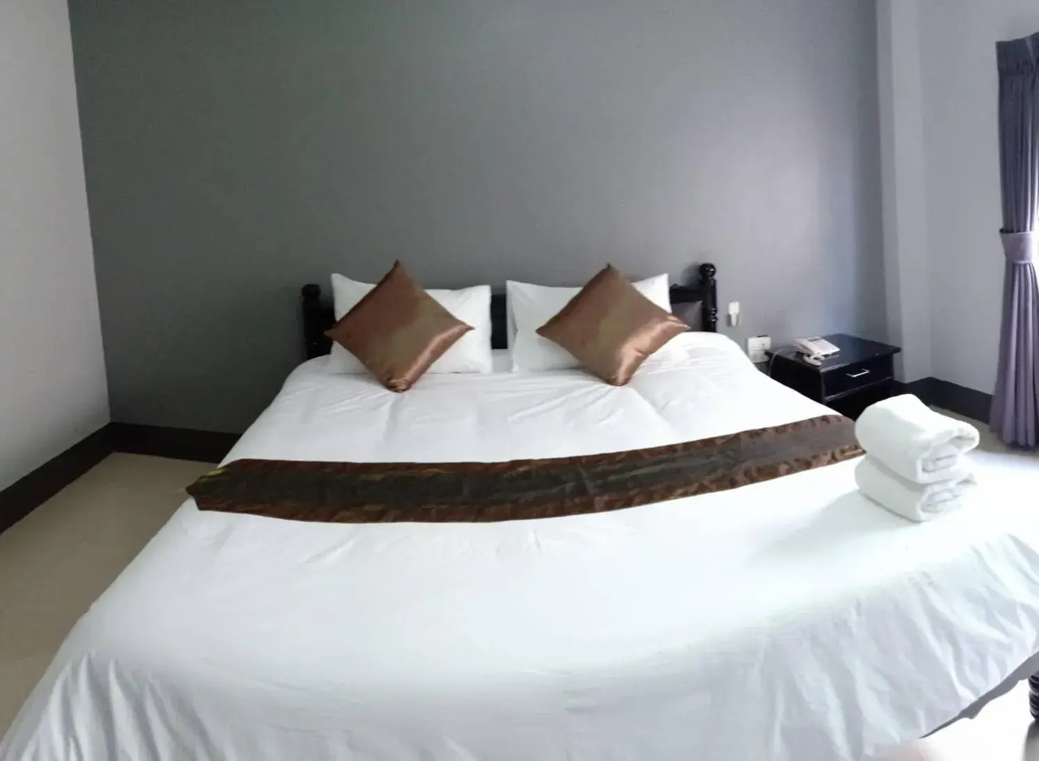 Bed in Submukda Phoomplace Hotel Bed in Submukda Phoomplace Hotel