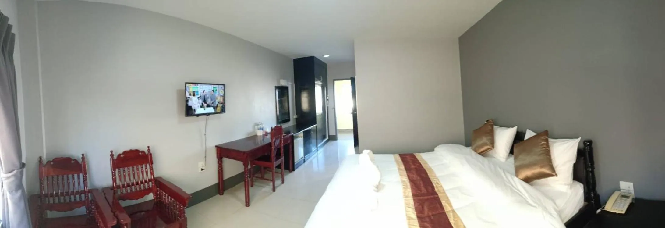 Bed in Submukda Phoomplace Hotel