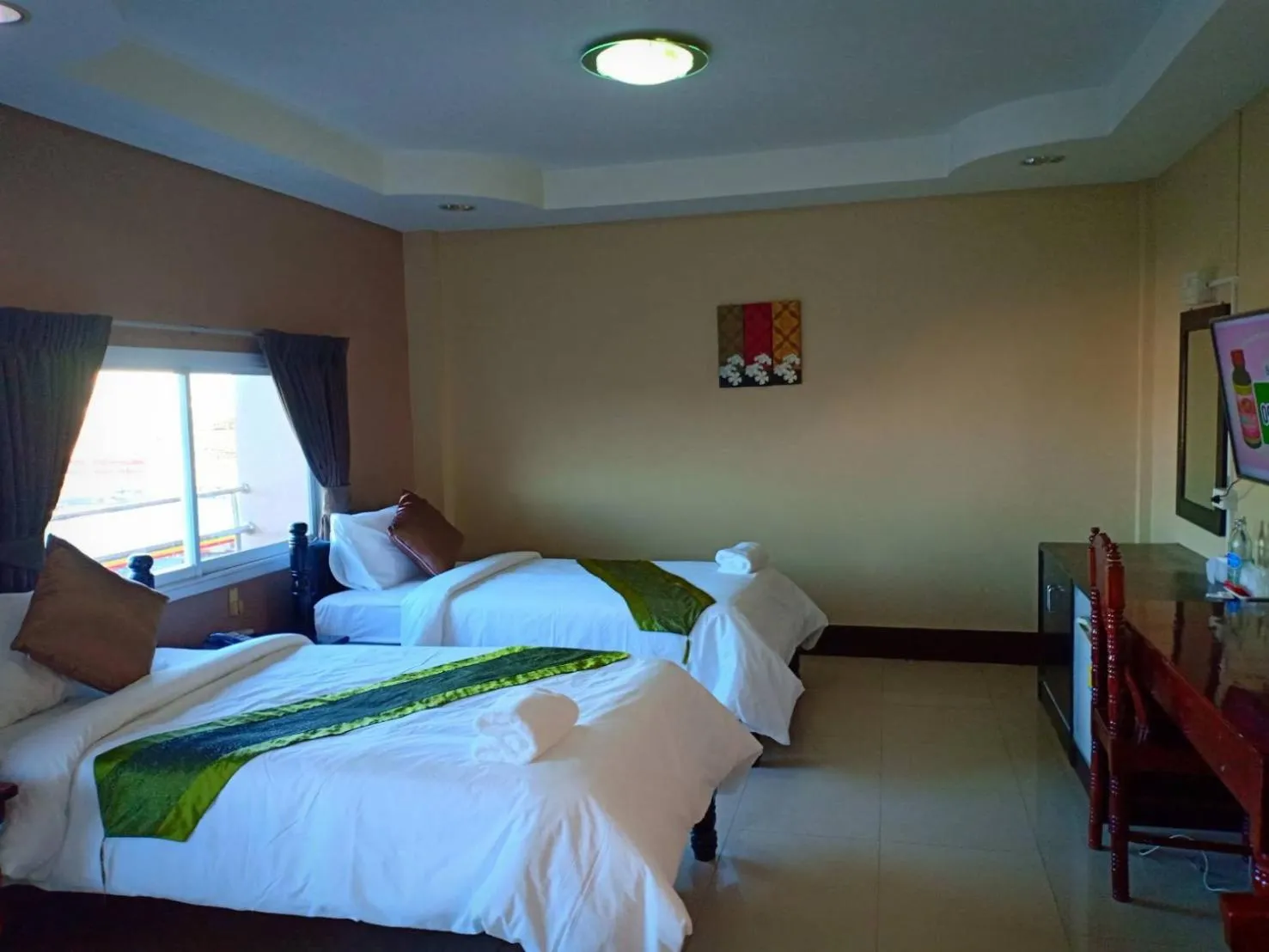 Bed in Submukda Phoomplace Hotel