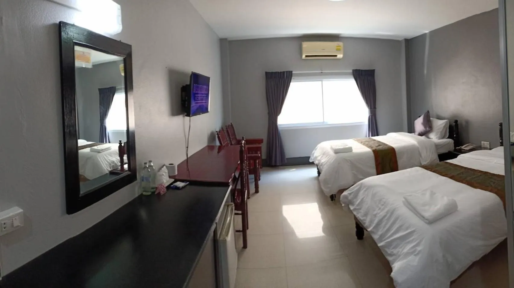 Bed in Submukda Phoomplace Hotel