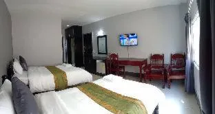 Bed in Submukda Phoomplace Hotel