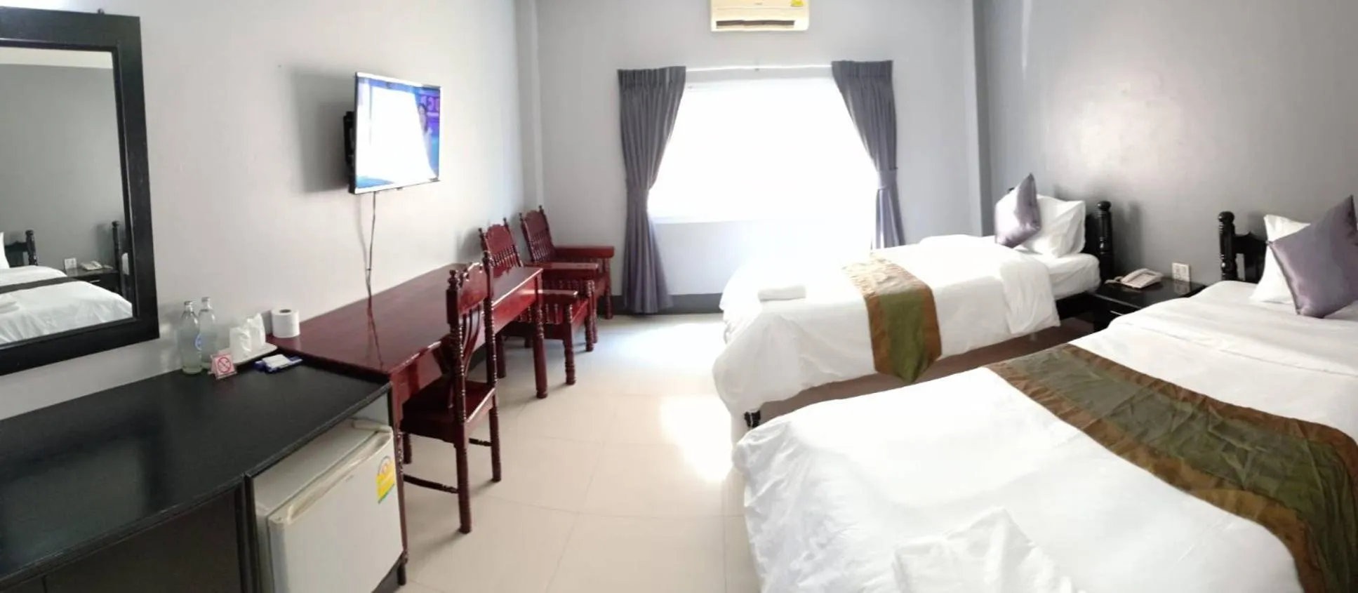 Bed in Submukda Phoomplace Hotel