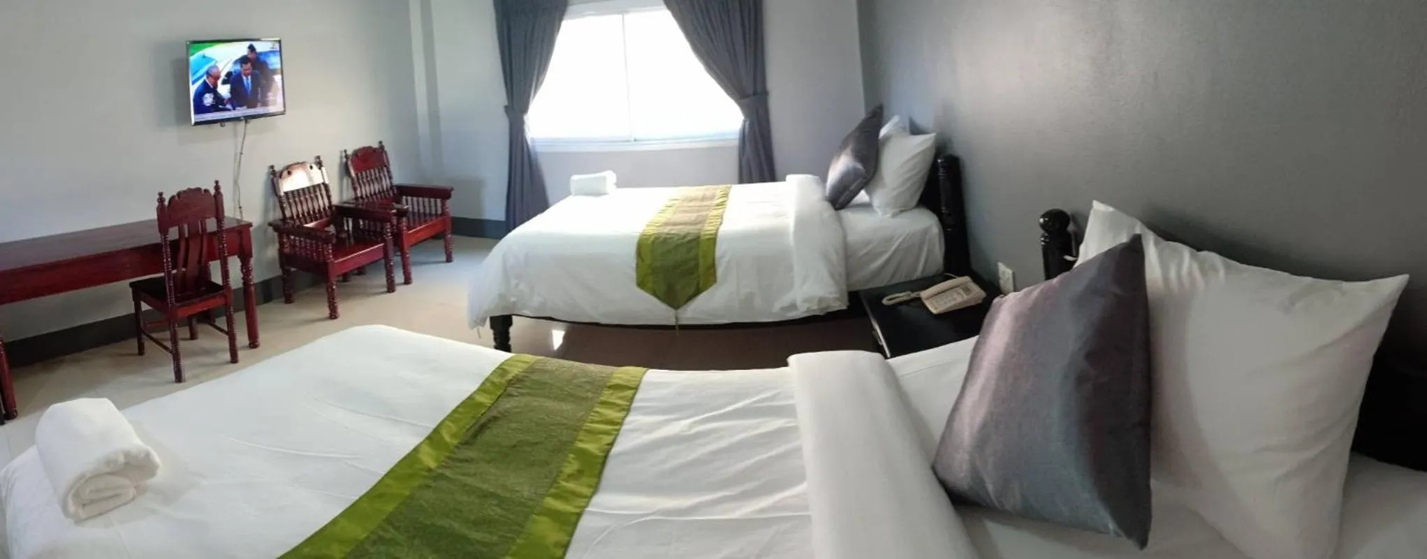 Bed in Submukda Phoomplace Hotel