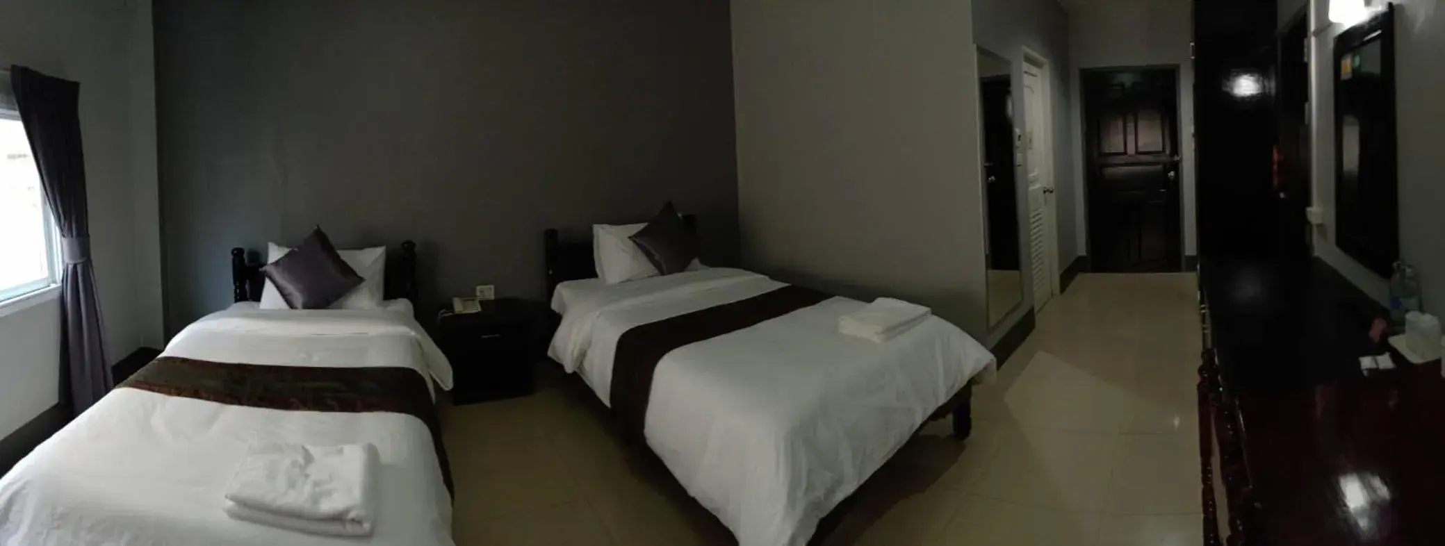 Bed in Submukda Phoomplace Hotel Bed in Submukda Phoomplace Hotel