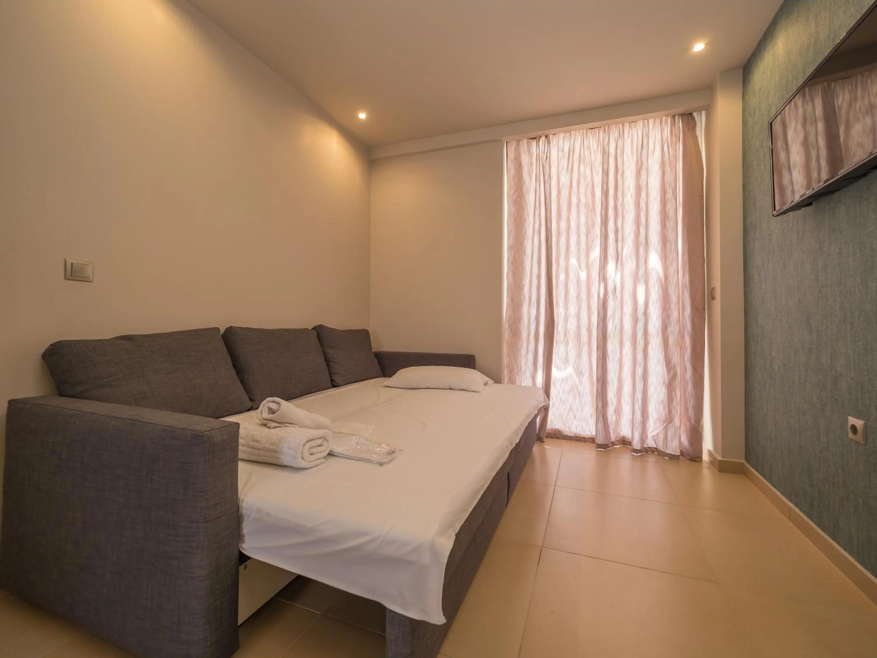 Living room, Bed in Paradise Resort