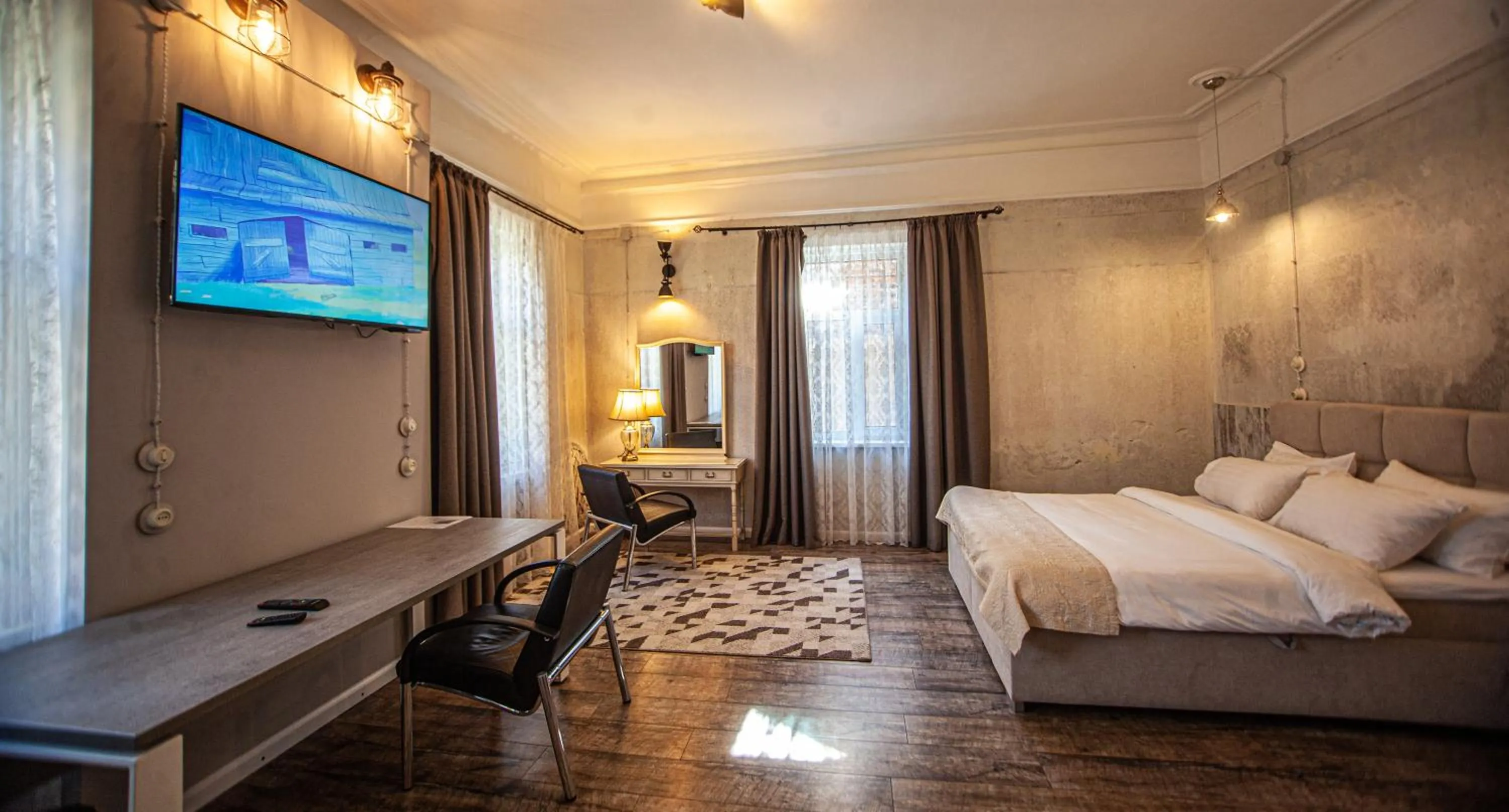 Communal lounge/ TV room, Bed in Biplan Hotel