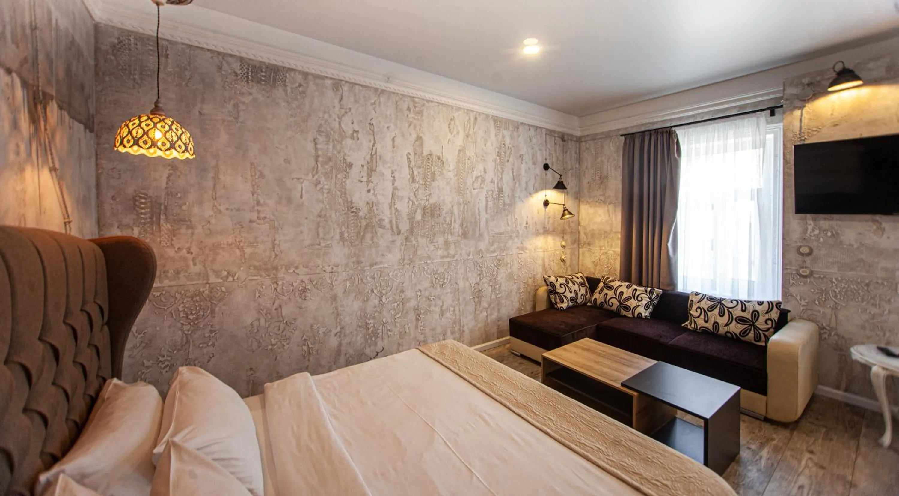 Seating area, Bed in Biplan Hotel