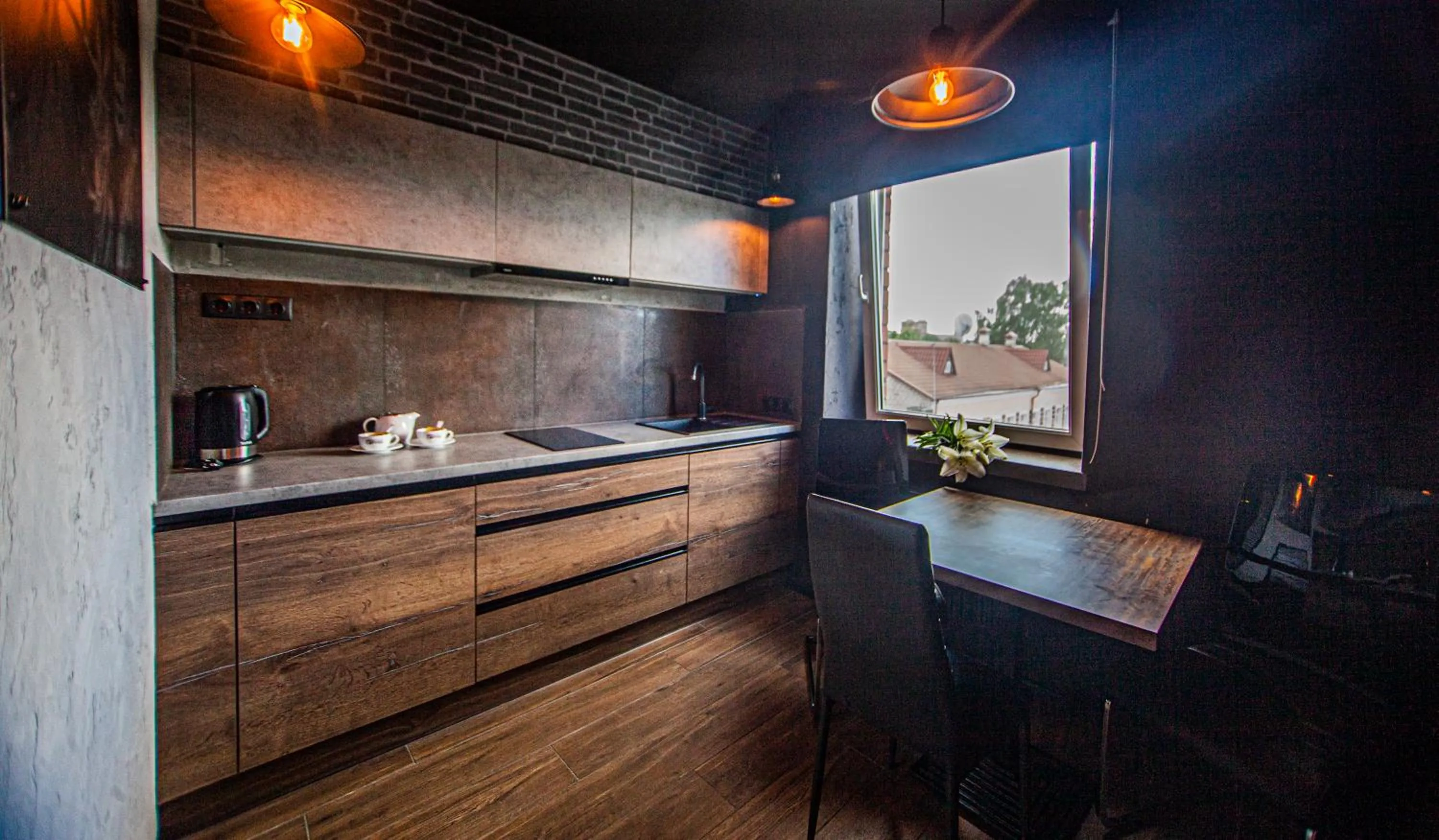 Kitchen or kitchenette in Biplan Hotel