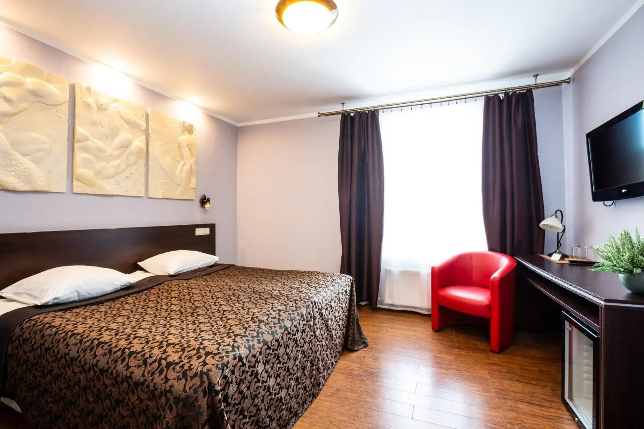 Photo of the whole room, Bed in PRIMO HOTEL RIGA with Free Parking Photo of the whole room, Bed in PRIMO HOTEL RIGA with Free Parking