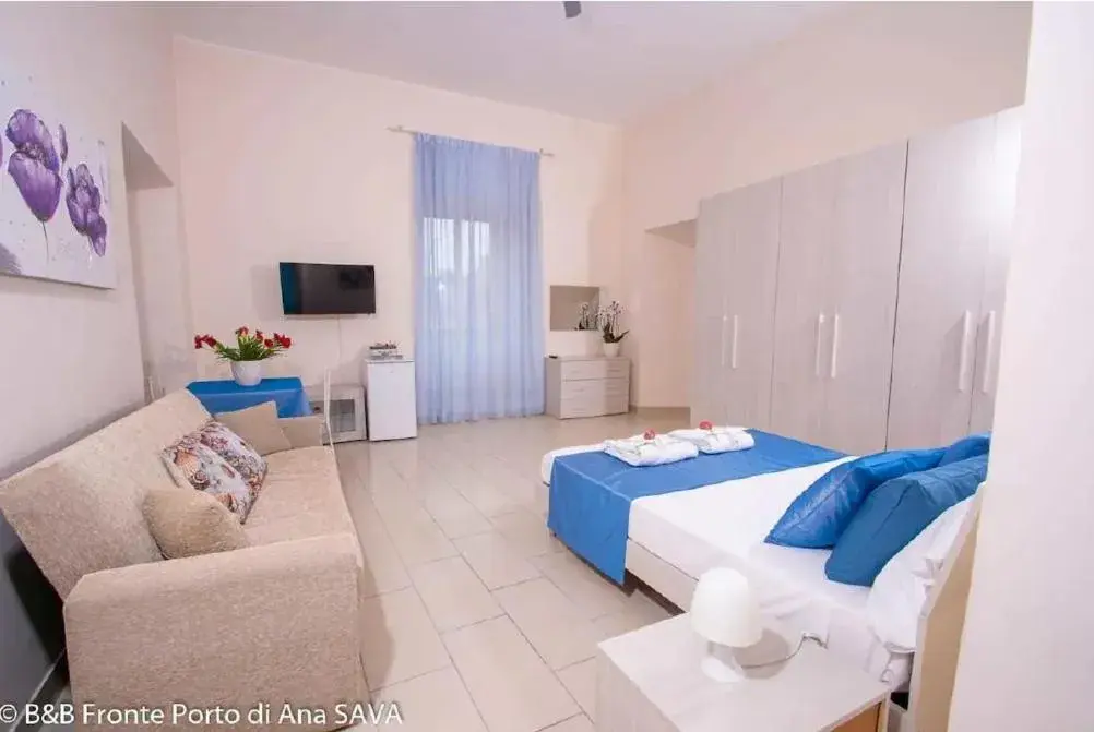 Quadruple Room with Private External Bathroom in Alloggio Turistico Port View Quadruple Room with Private External Bathroom in Alloggio Turistico Port View