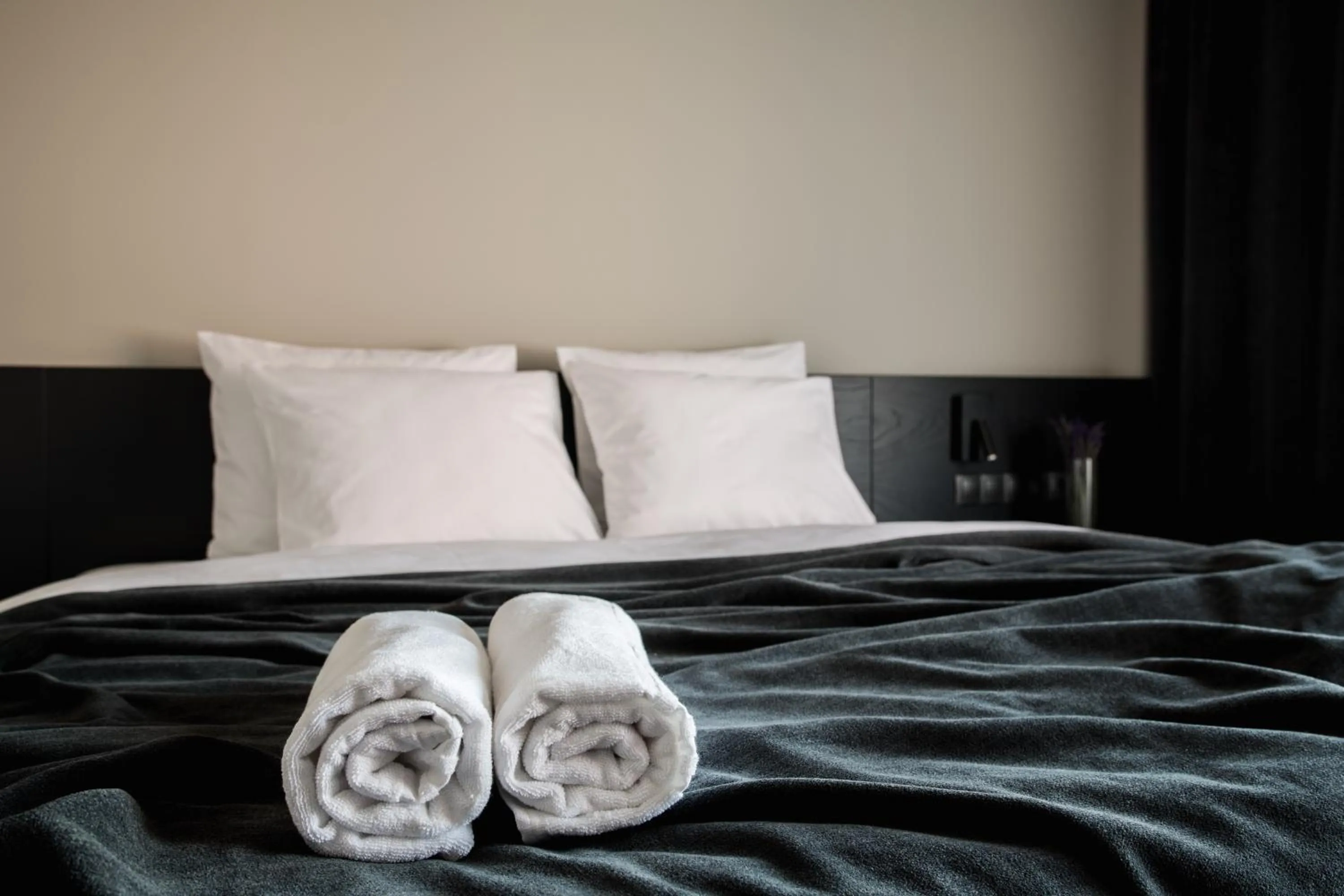 Bed in Maestro Design Hotel