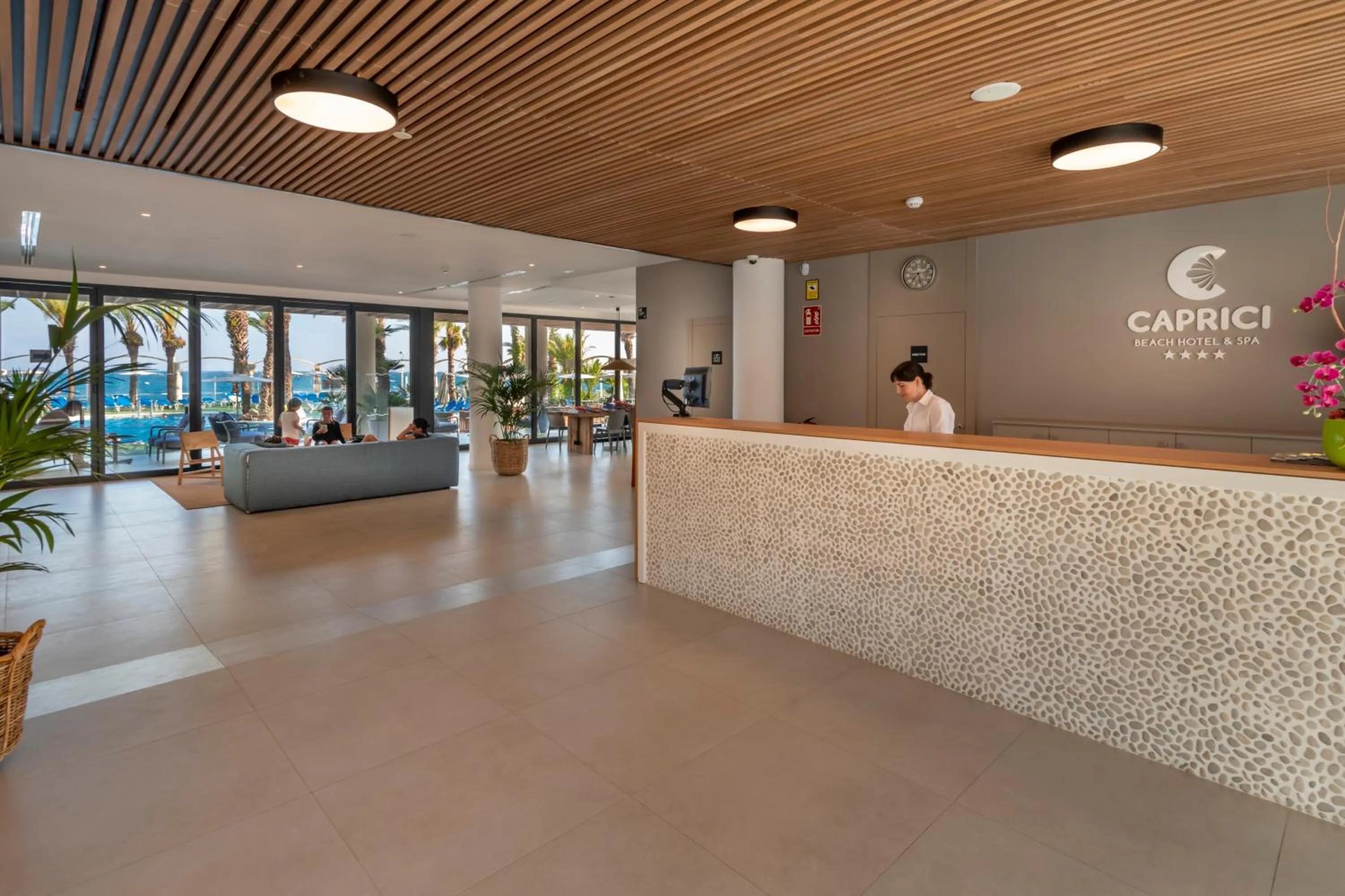 Lobby or reception in Caprici Beach Hotel & Spa