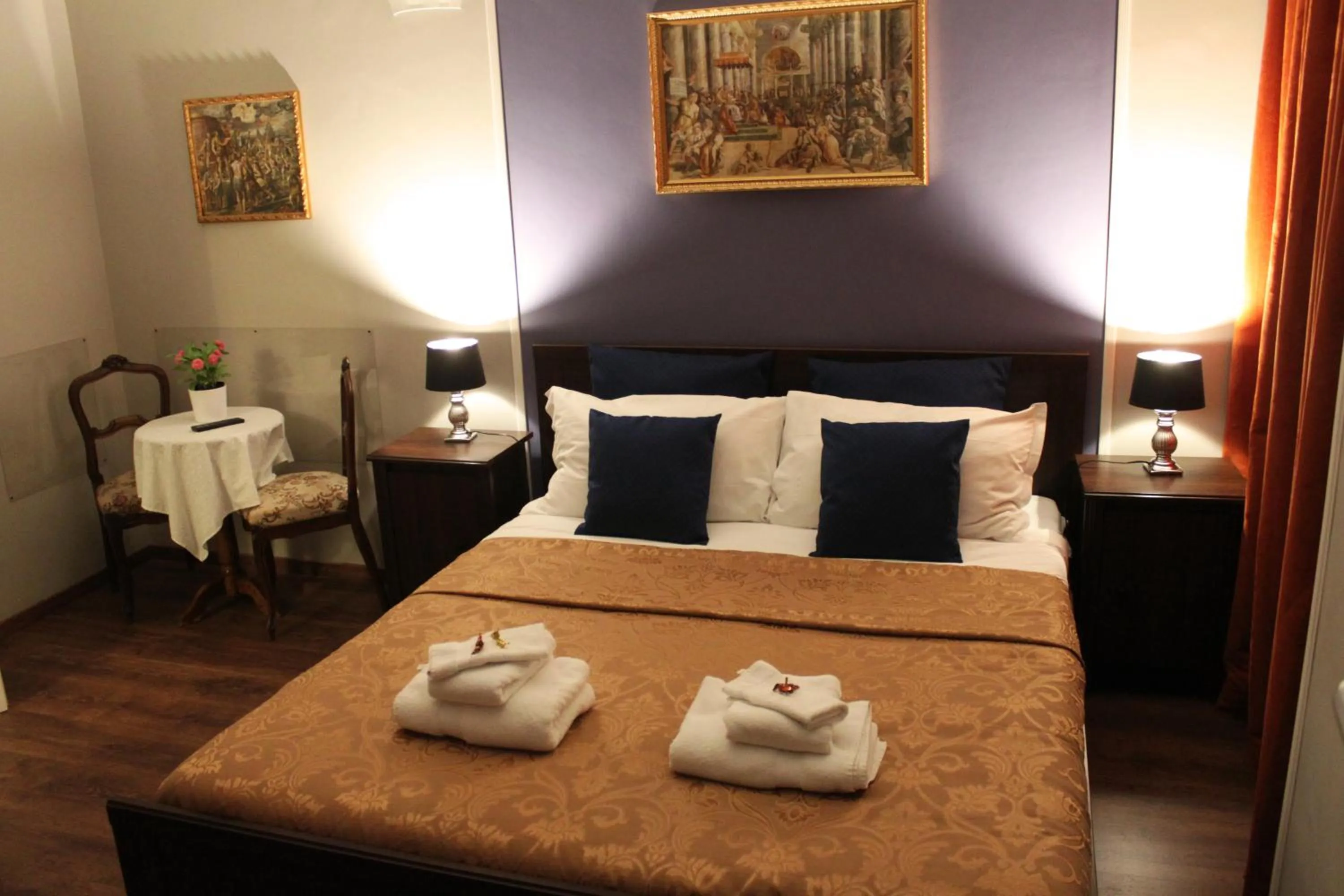 Bed in Raphael Rooms