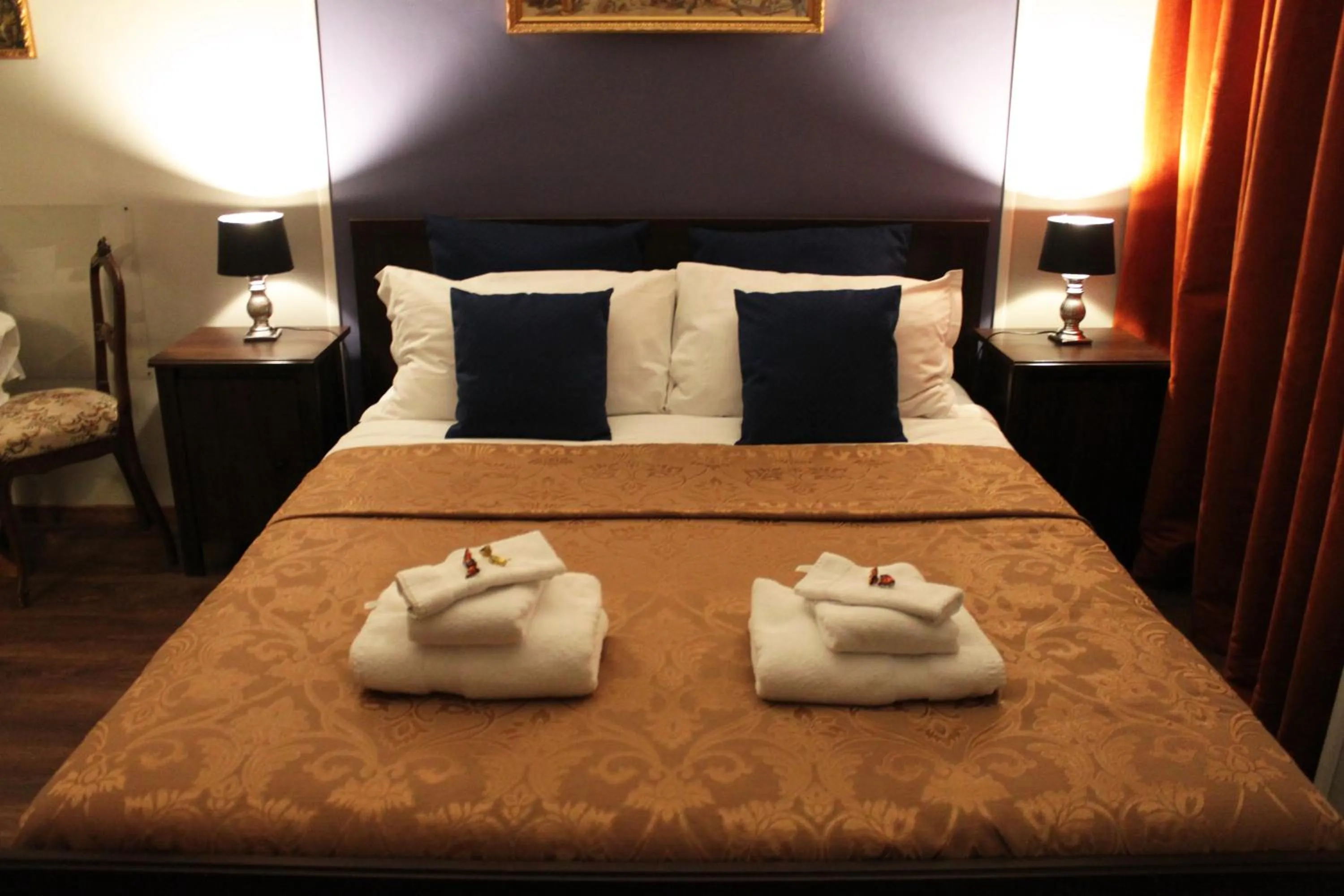 Bed in Raphael Rooms