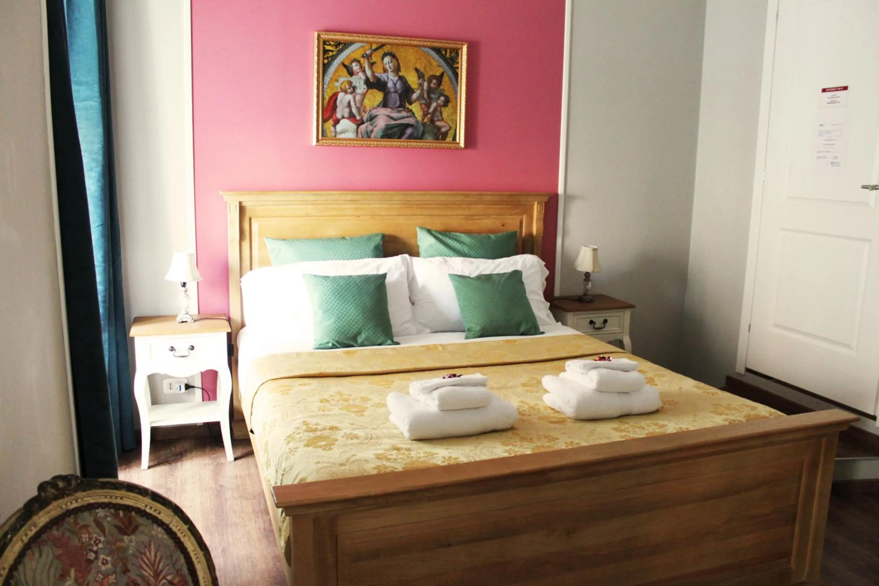 Bed in Raphael Rooms