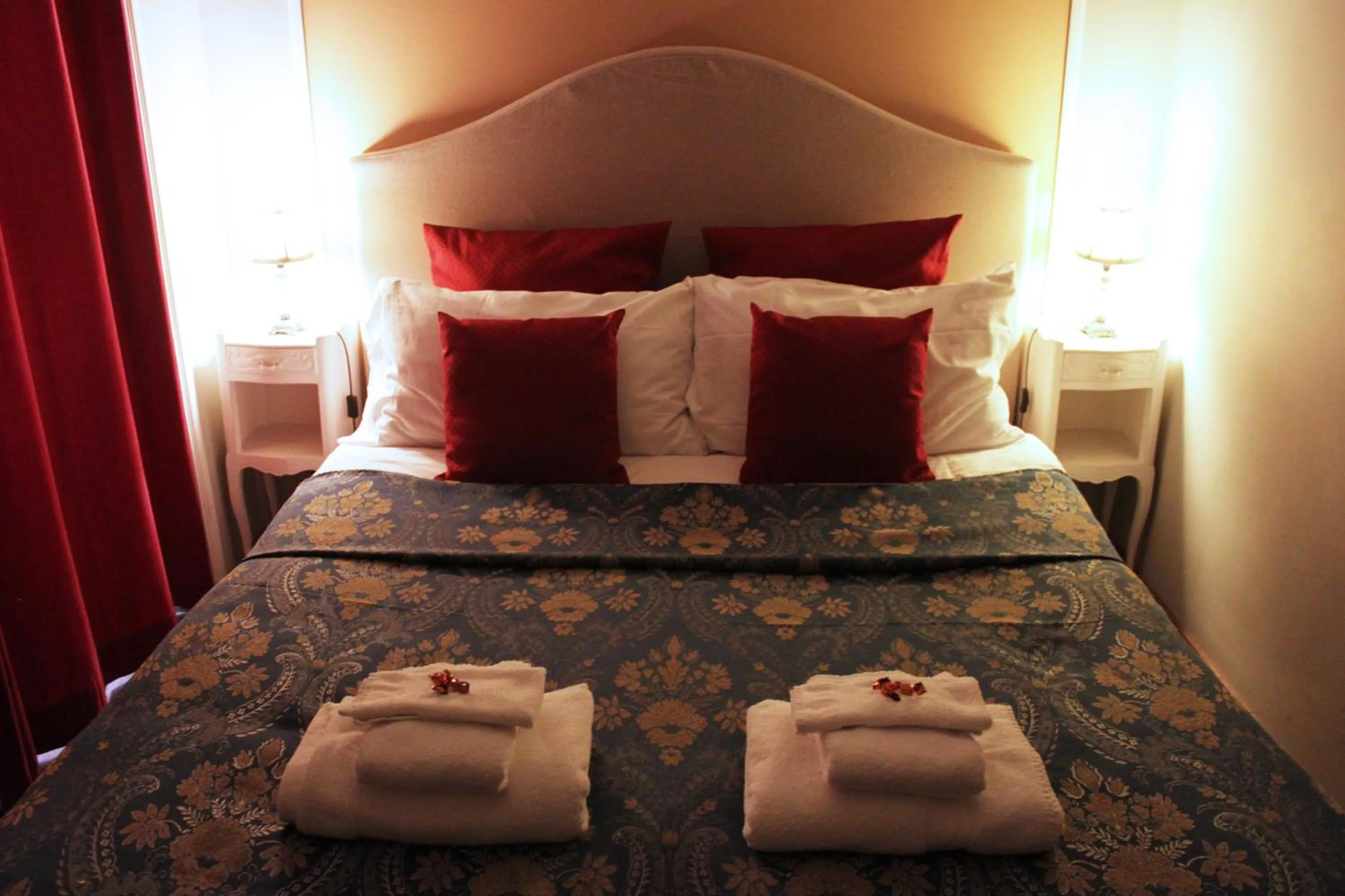 Bed in Raphael Rooms