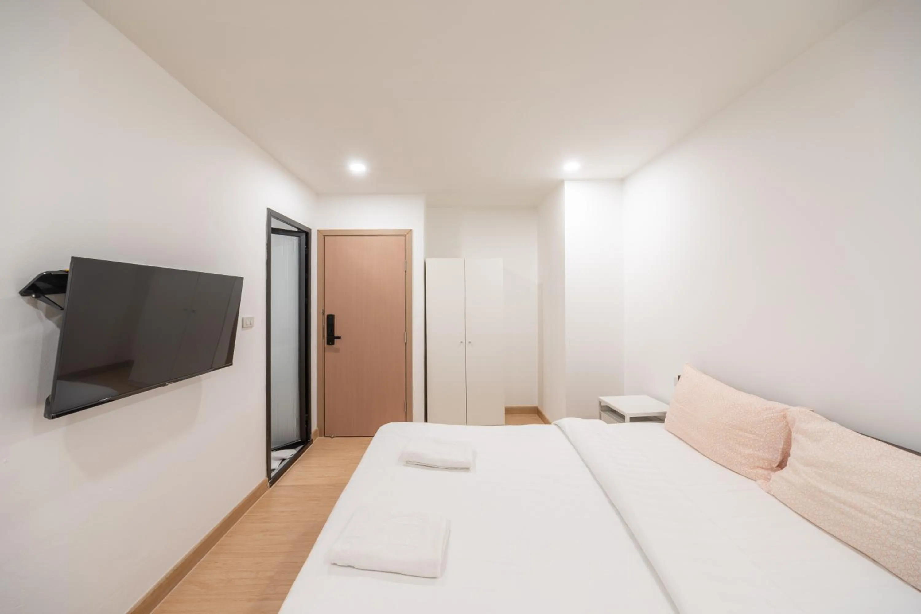 Photo of the whole room, Bed in We Inn