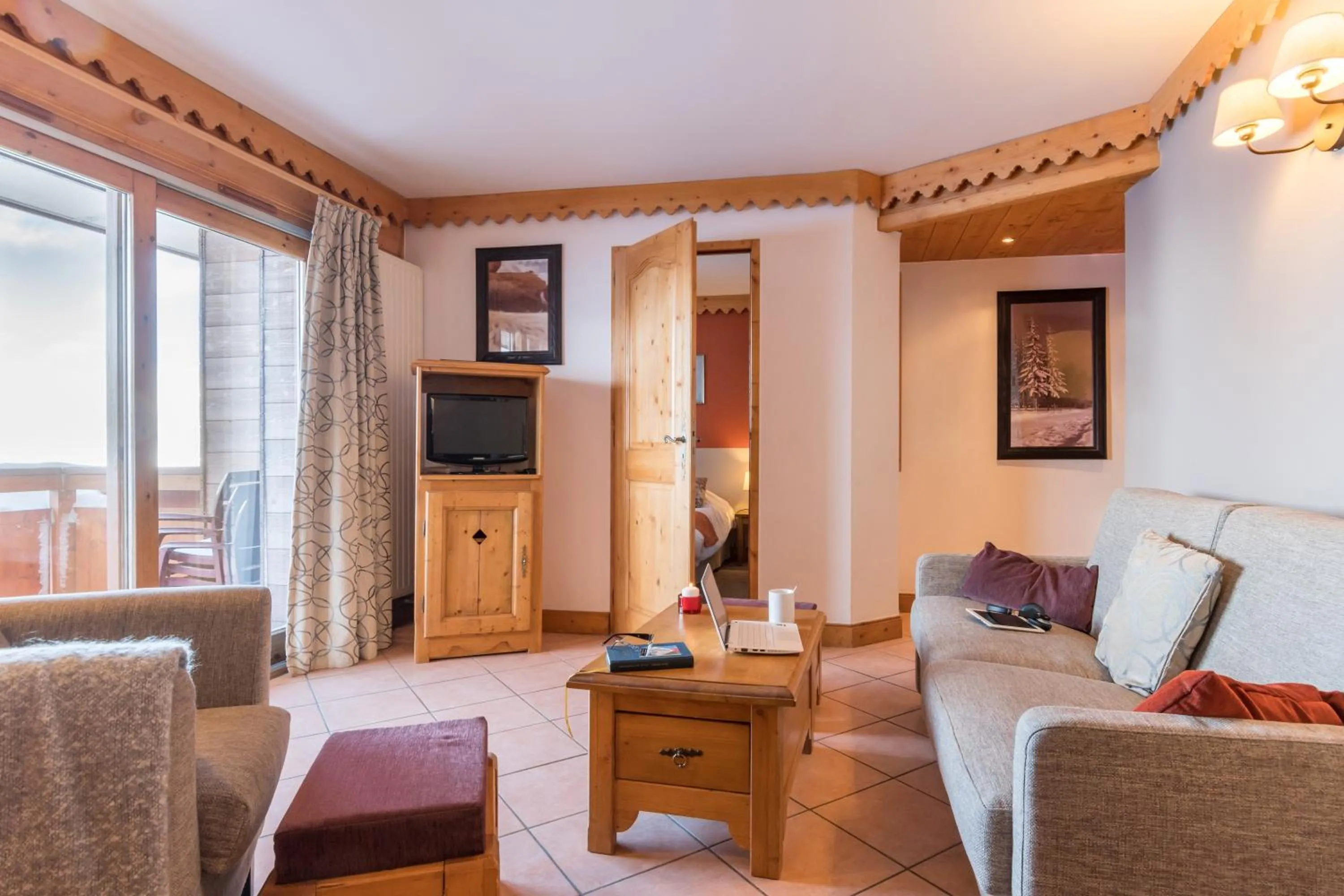 Communal lounge/ TV room in Résidence Pierre & Vacances Premium Les Hauts Bois