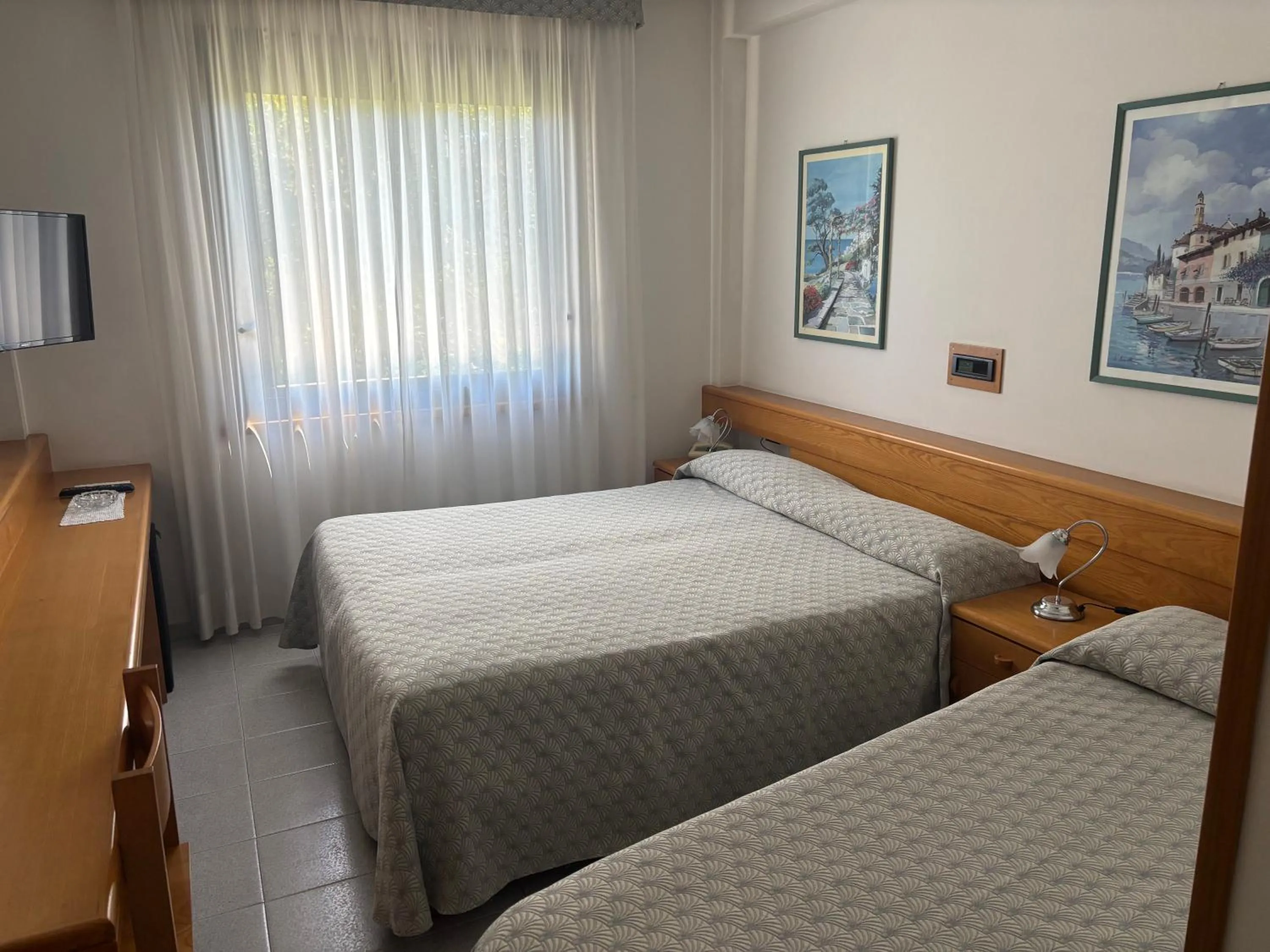 Bed in Hotel Le Palme