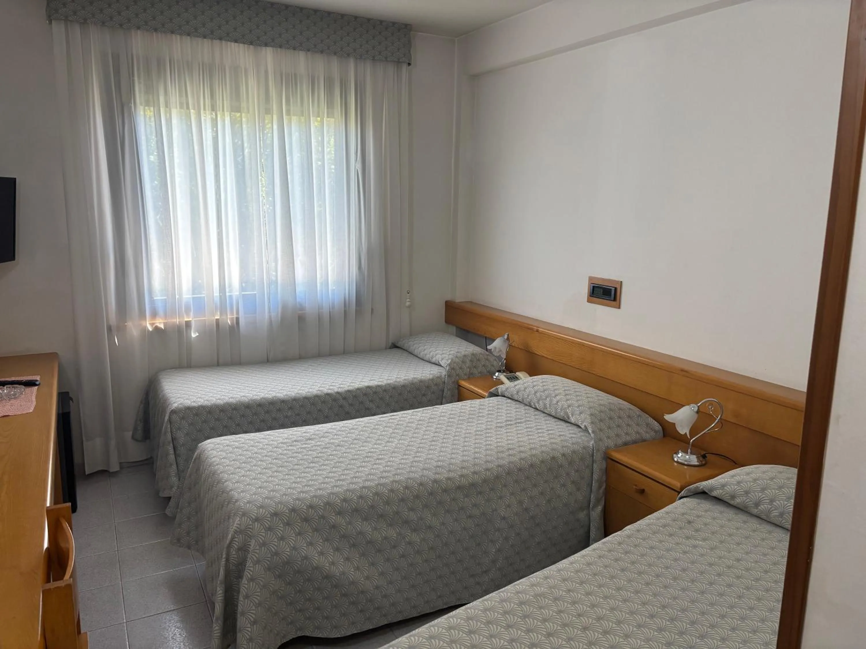 Bed in Hotel Le Palme