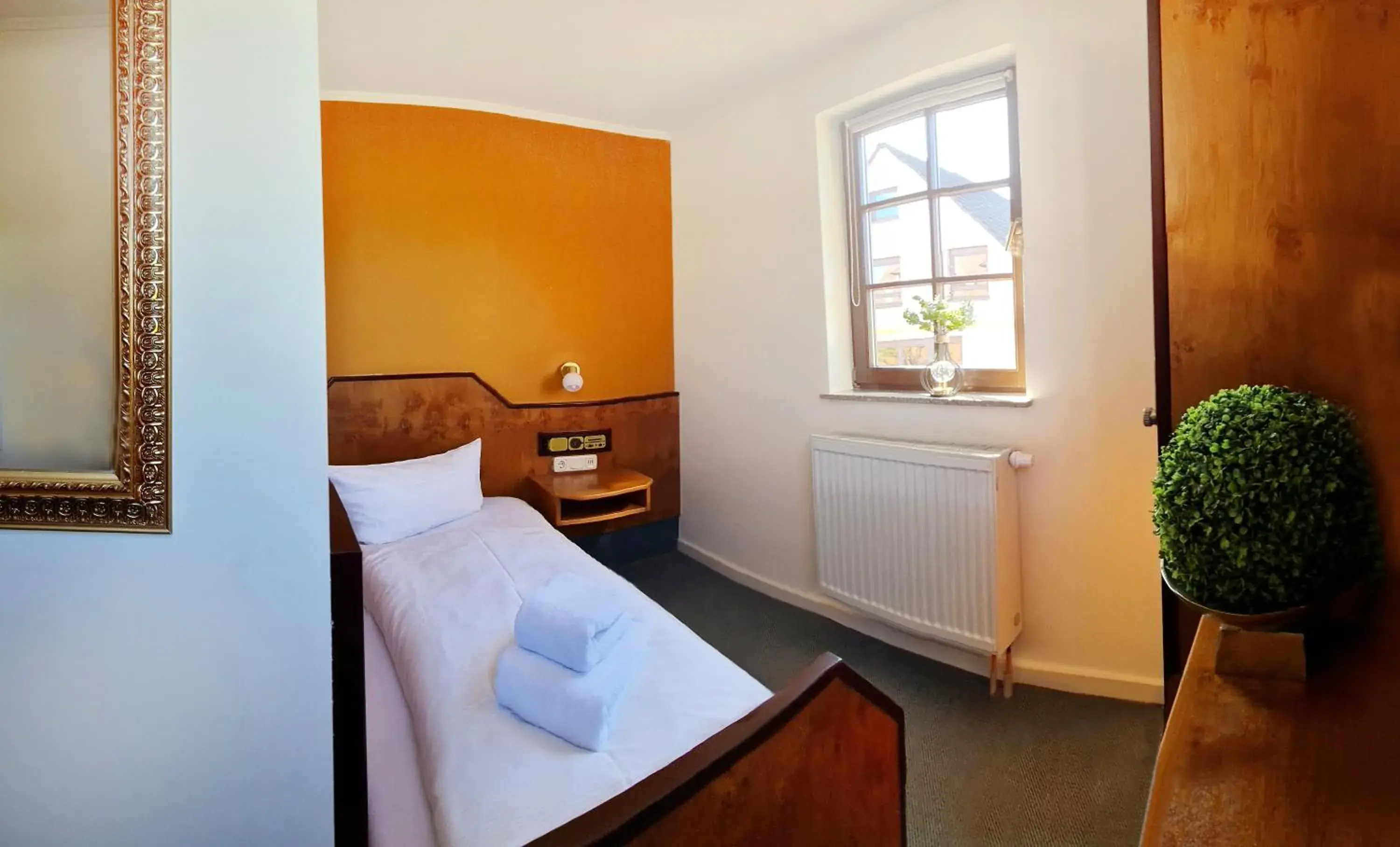 Photo of the whole room, Bed in Häuser der Villa Italia Photo of the whole room, Bed in Häuser der Villa Italia