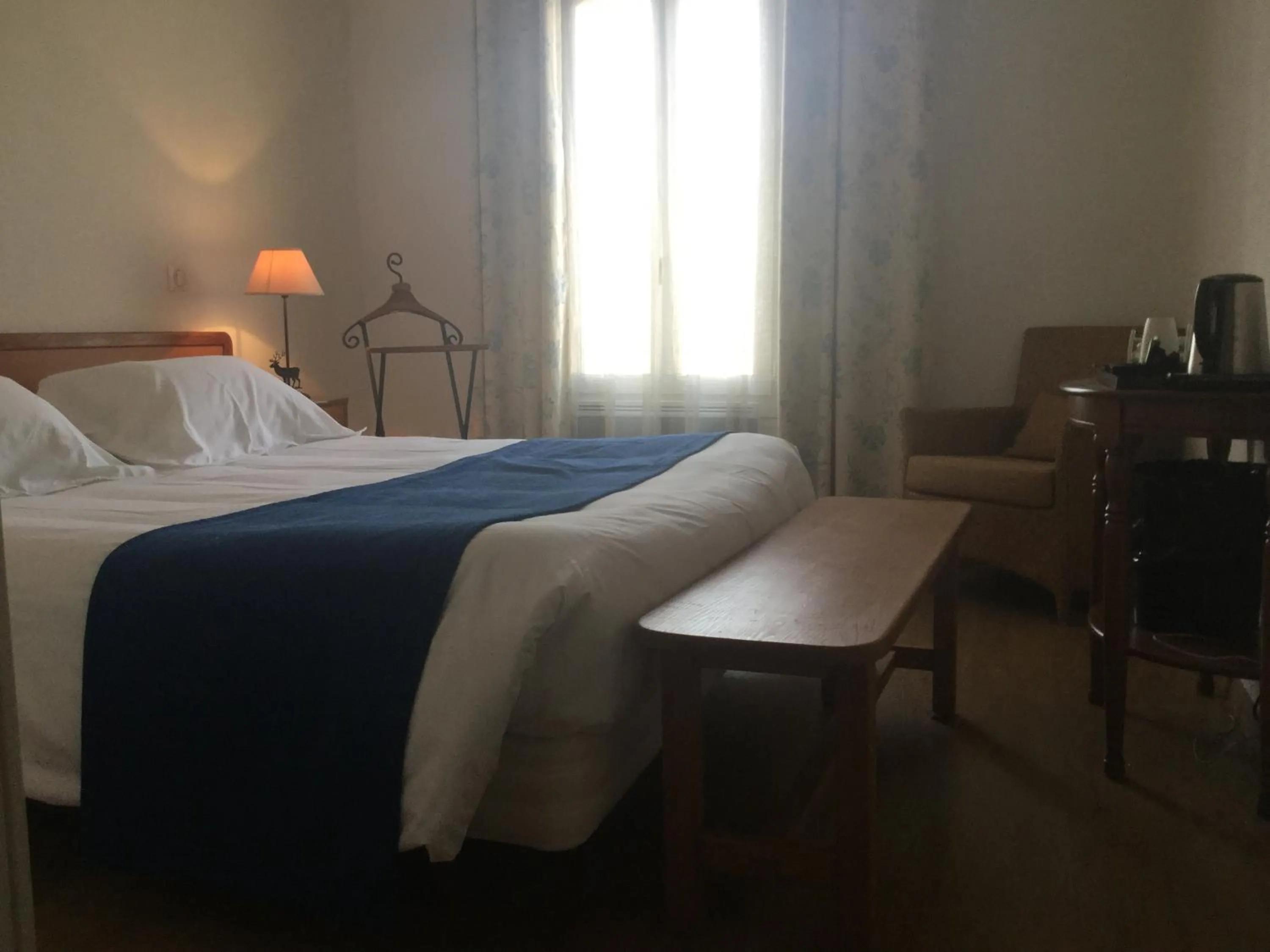 Photo of the whole room, Bed in Nouvel Hôtel du Commerce