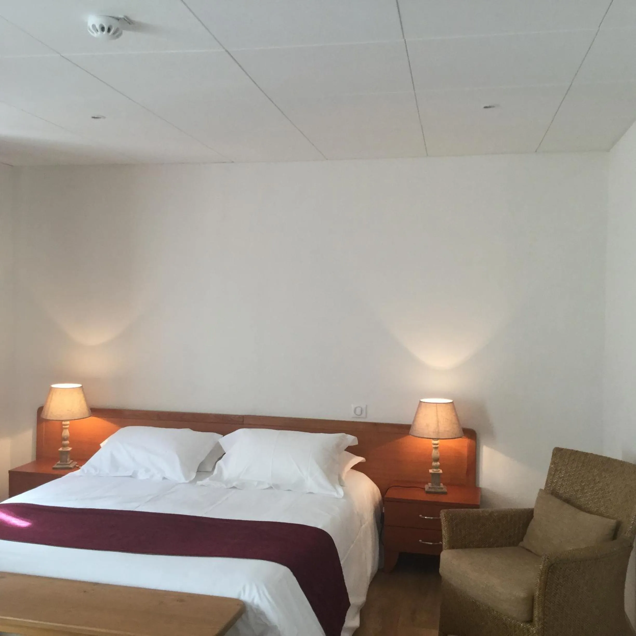 Photo of the whole room, Bed in Nouvel Hôtel du Commerce